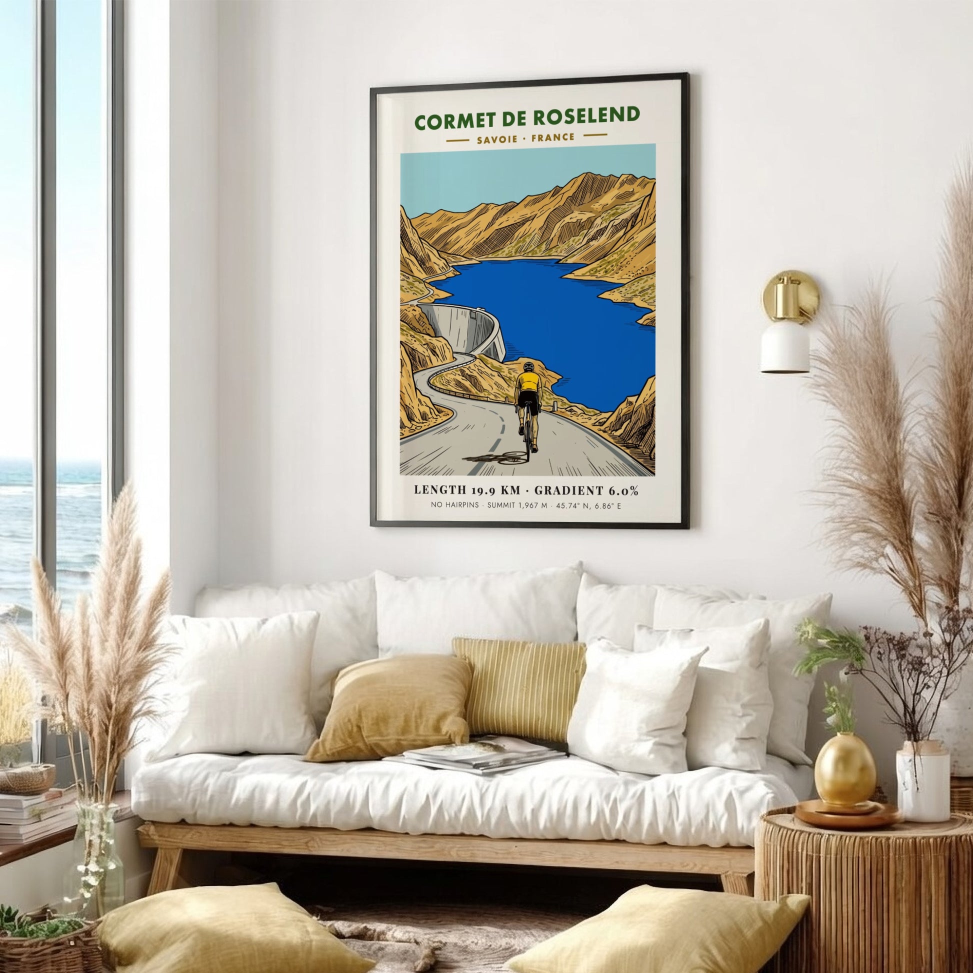 Poster of a cyclist climbing the Cormet de Roselend road above a blue reservoir.