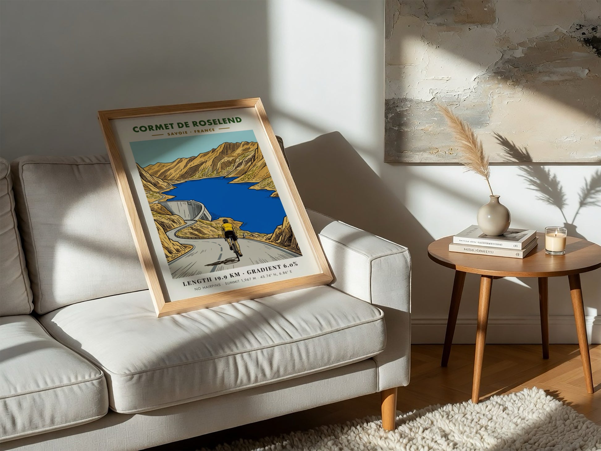 Poster of a cyclist climbing the Cormet de Roselend road above a blue reservoir.