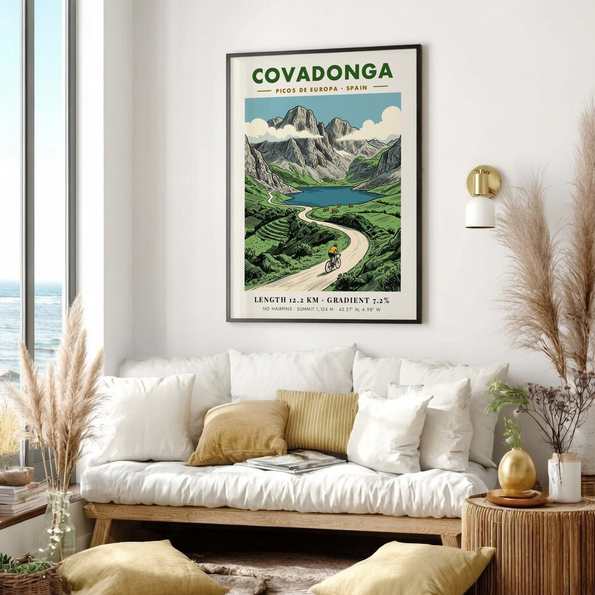 Poster of a cyclist riding through the scenic Covadonga Picos de Europa mountain range.