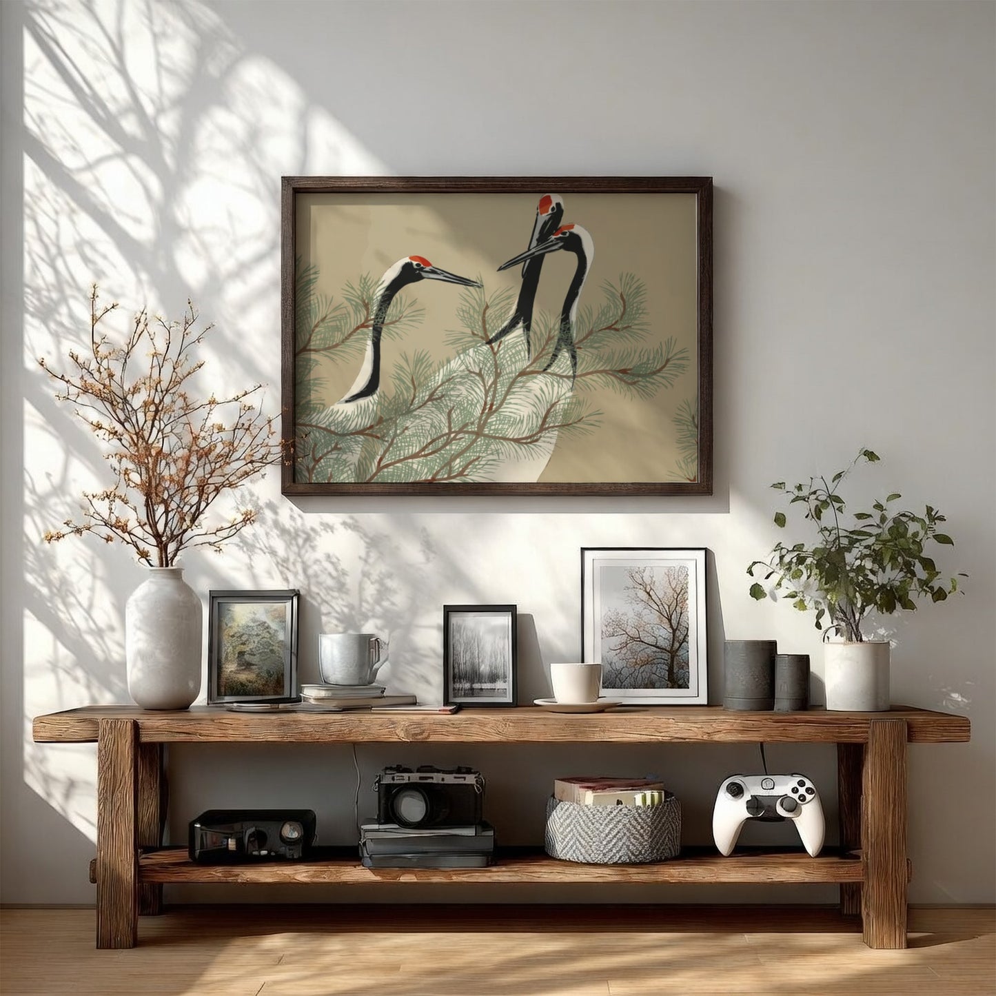 A framed drawing titled 'Cranes (1909)' by Kamisaka Sekka, featuring three cranes amidst pine branches in a