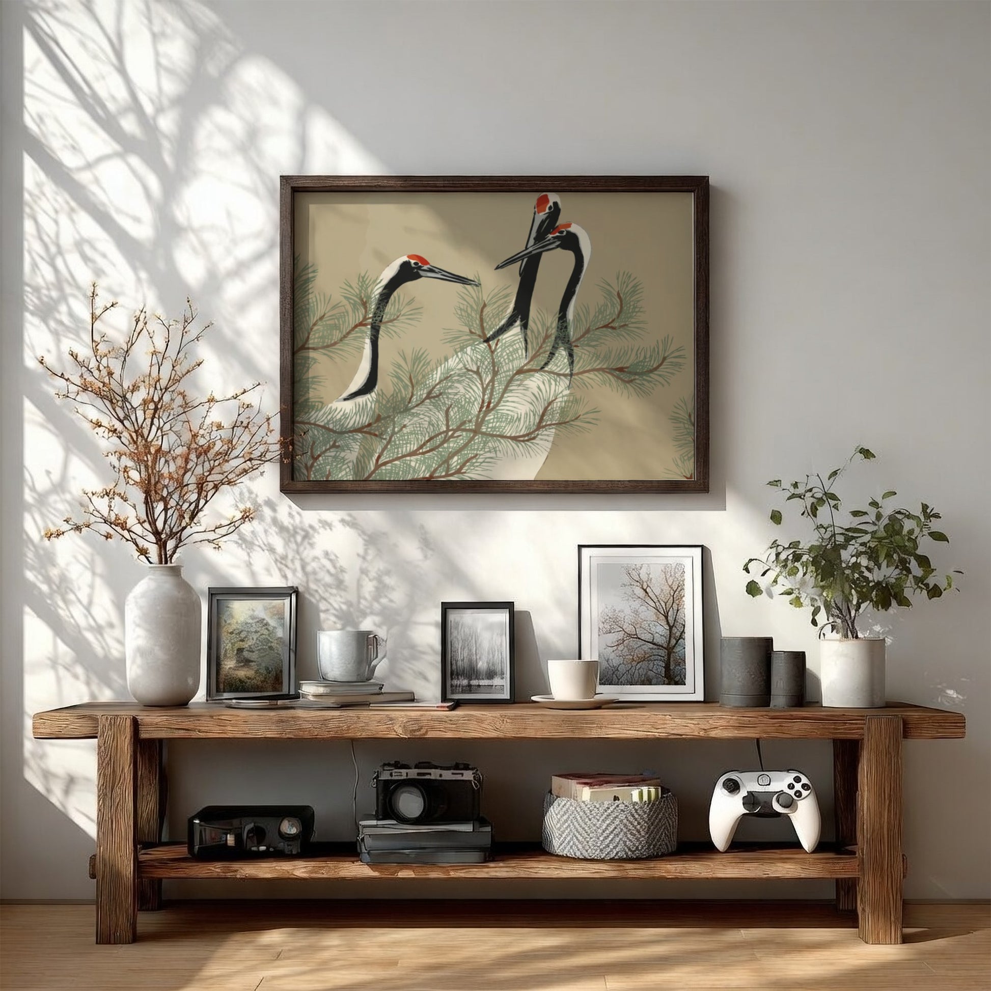 A framed drawing titled 'Cranes (1909)' by Kamisaka Sekka, featuring three cranes amidst pine branches in a