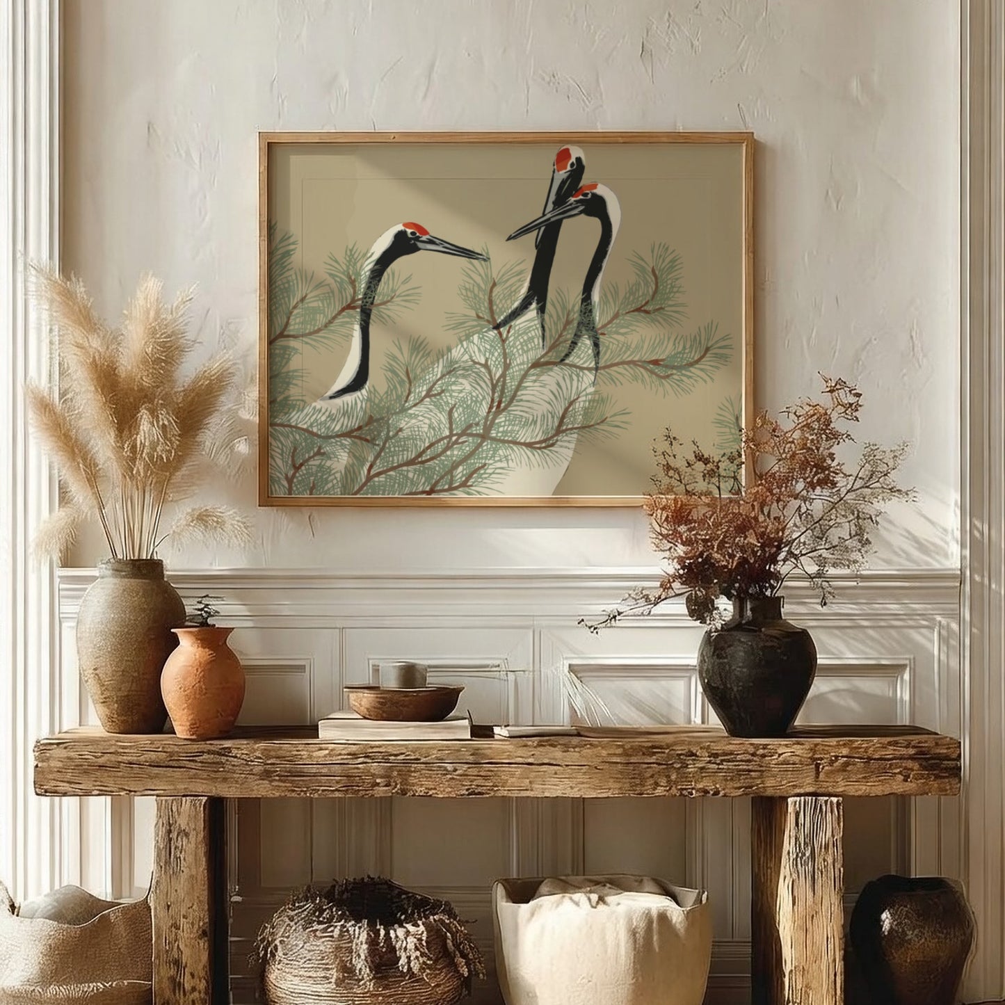 A framed drawing titled 'Cranes (1909)' by Kamisaka Sekka, featuring three cranes amidst pine branches in a
