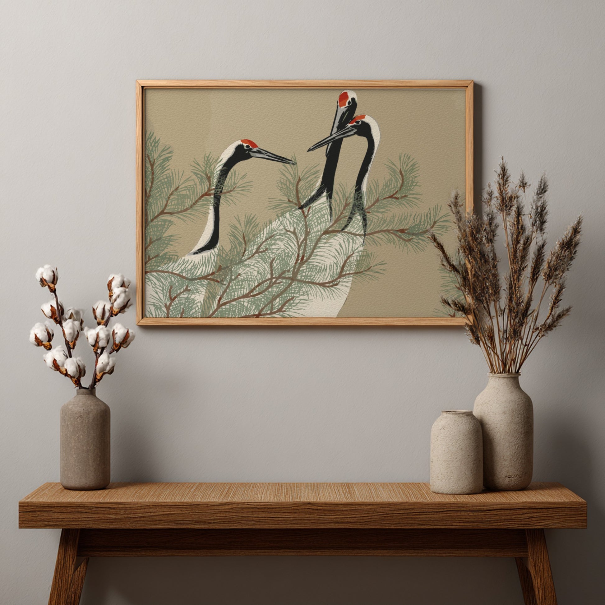 A framed drawing titled 'Cranes (1909)' by Kamisaka Sekka, featuring three cranes amidst pine branches in a