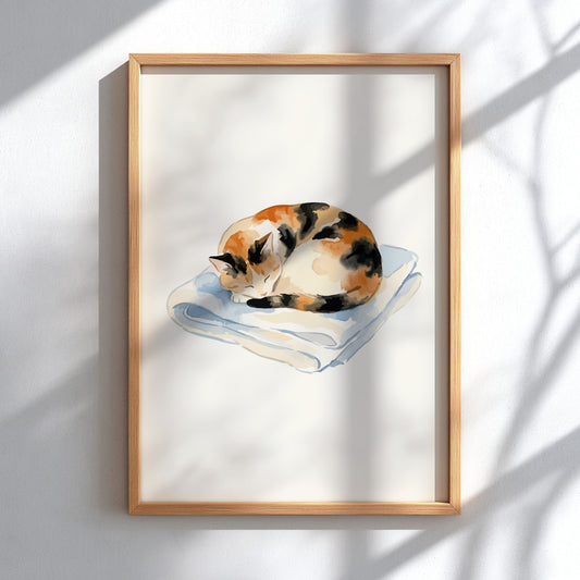 Watercolour poster of a sleeping calico cat curled up on a light blue blanket
