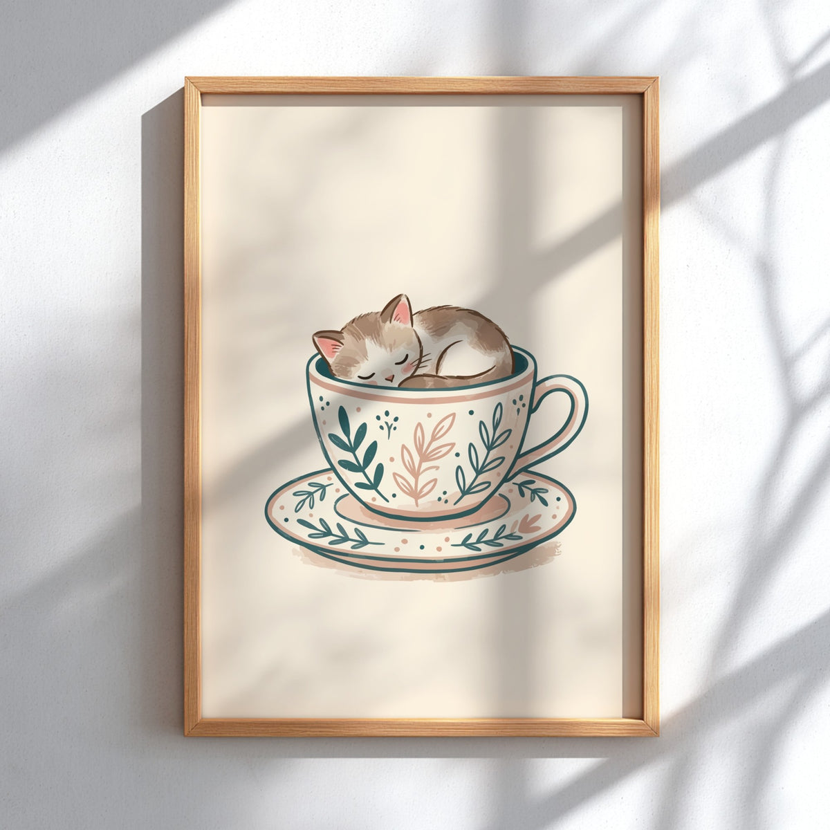 Poster of a small tabby kitten sleeping inside a floral patterned tea cup saucer