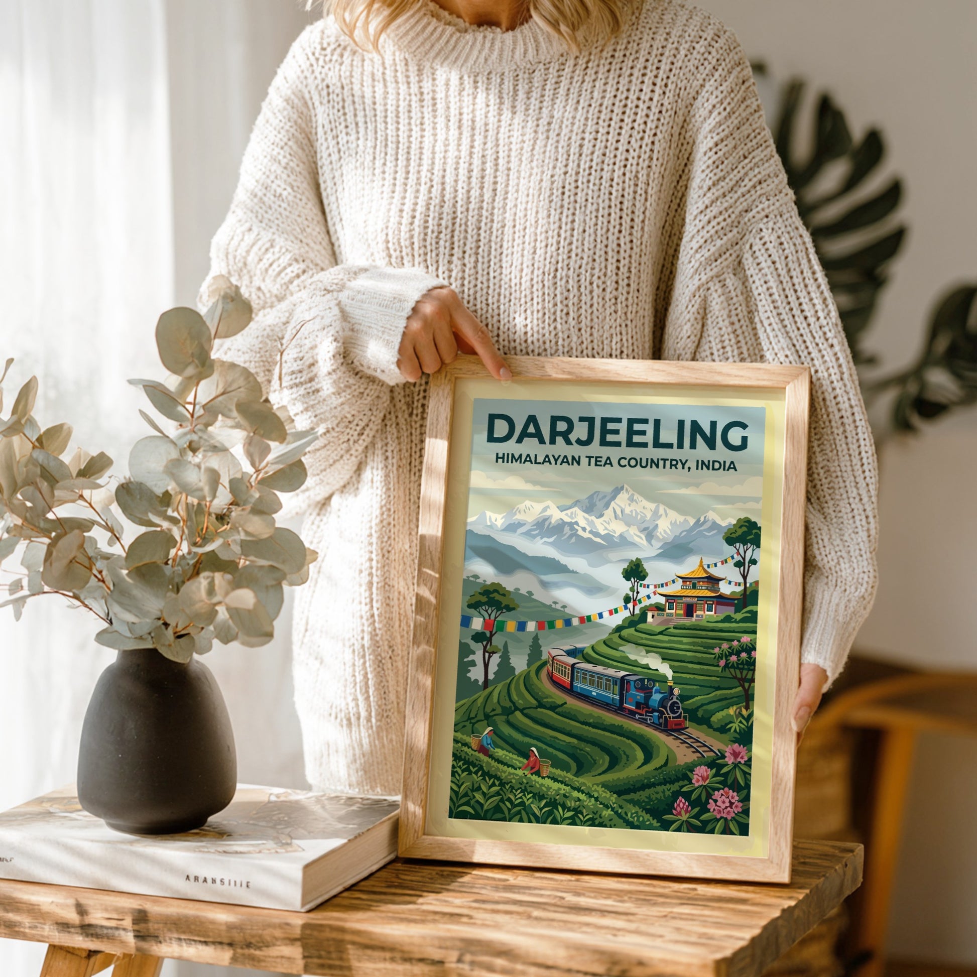 Travel poster of Darjeeling Himalayan Tea Country with a steam train and mountains.