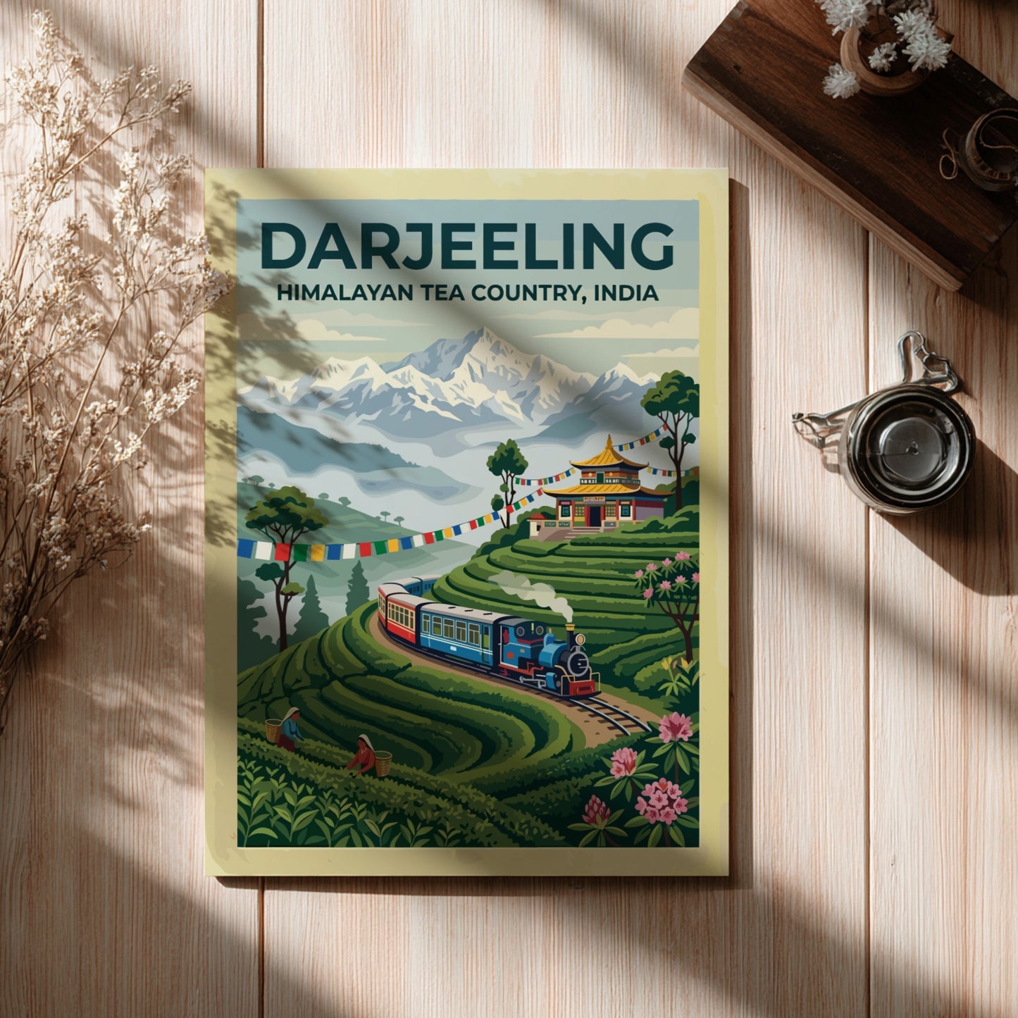 Travel poster of Darjeeling Himalayan Tea Country with a steam train and mountains.