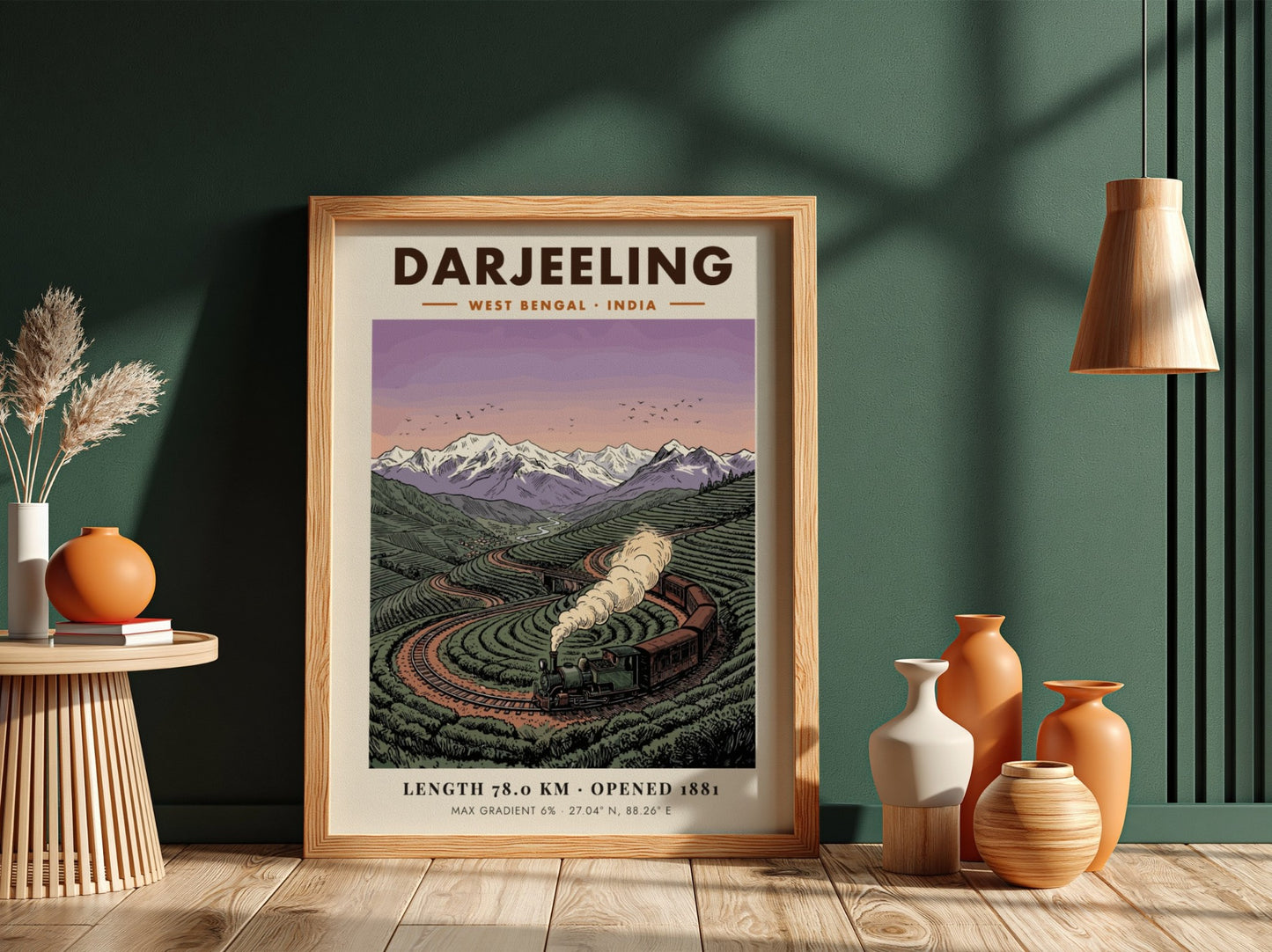 Poster showing a vintage steam train winding through green tea fields in Darjeeling India