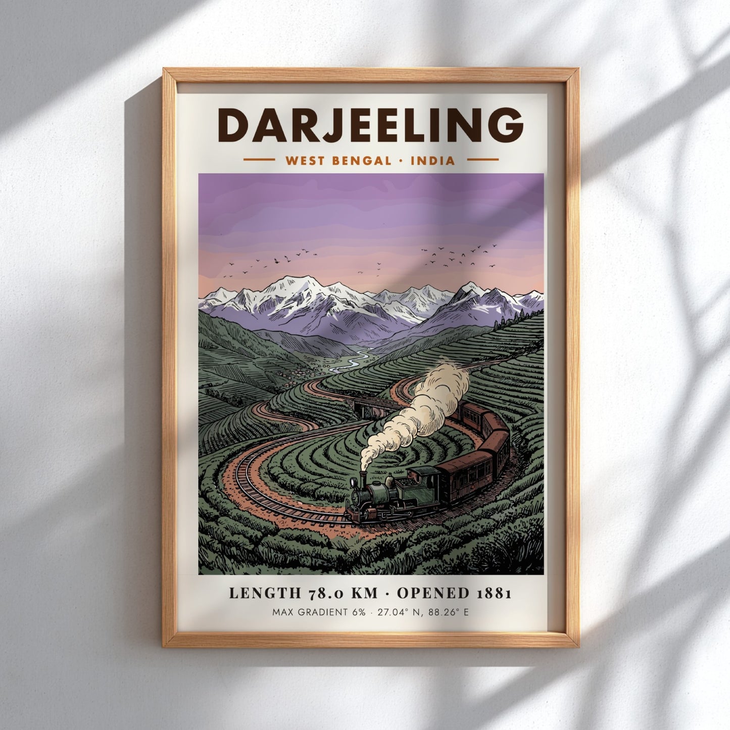 Poster showing a vintage steam train winding through green tea fields in Darjeeling India