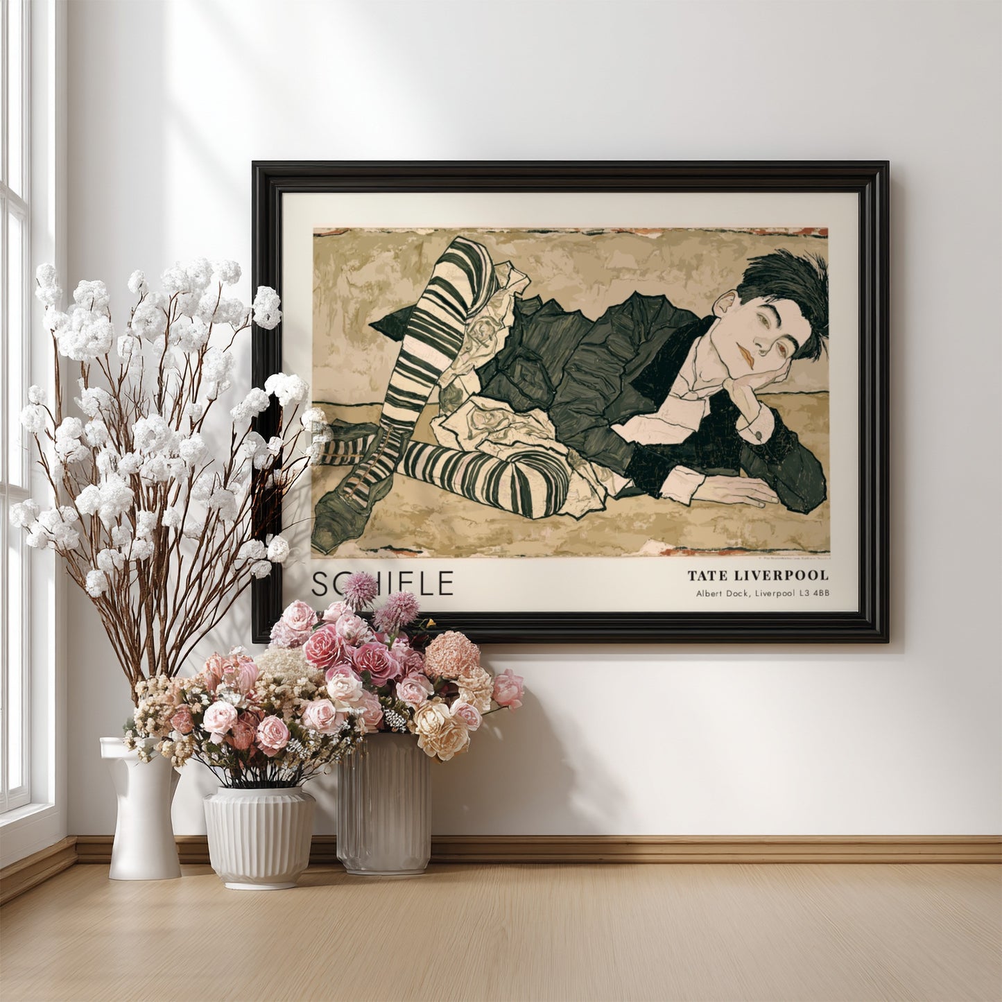 Wall art poster featuring an Egon Schiele portrait with striped stockings and text.