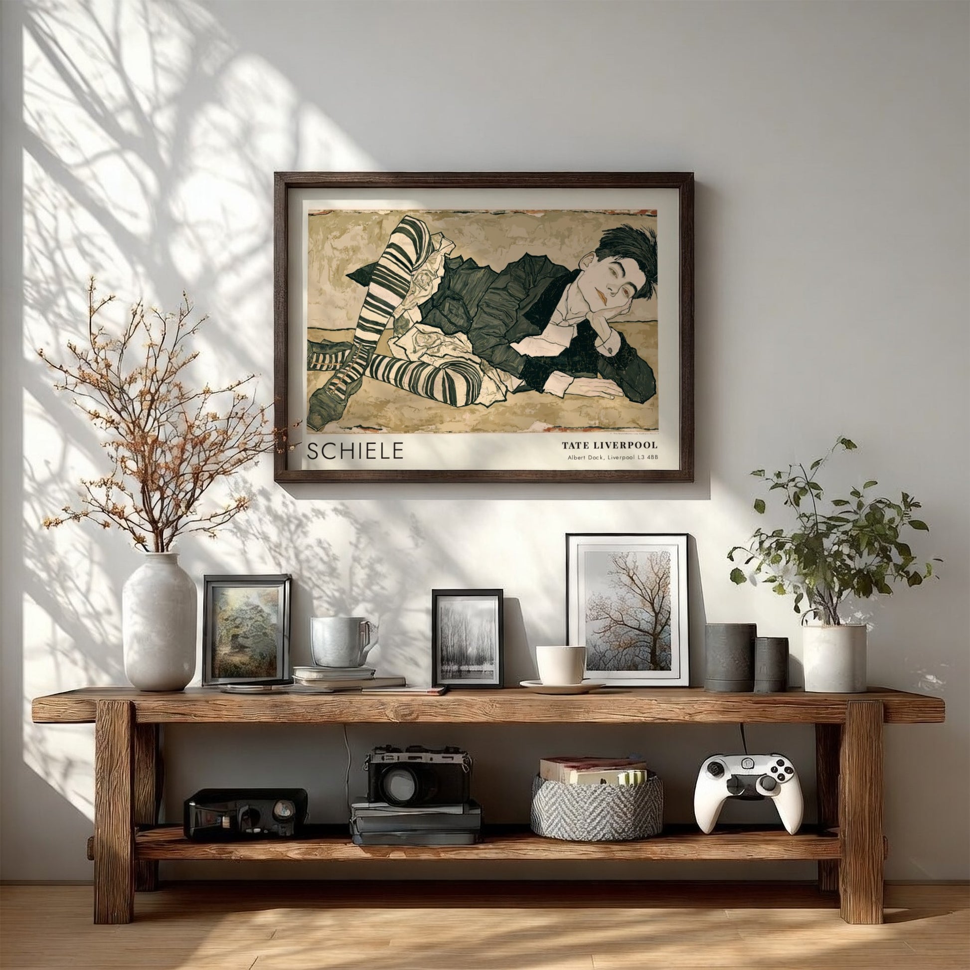 Wall art poster featuring an Egon Schiele portrait with striped stockings and text.