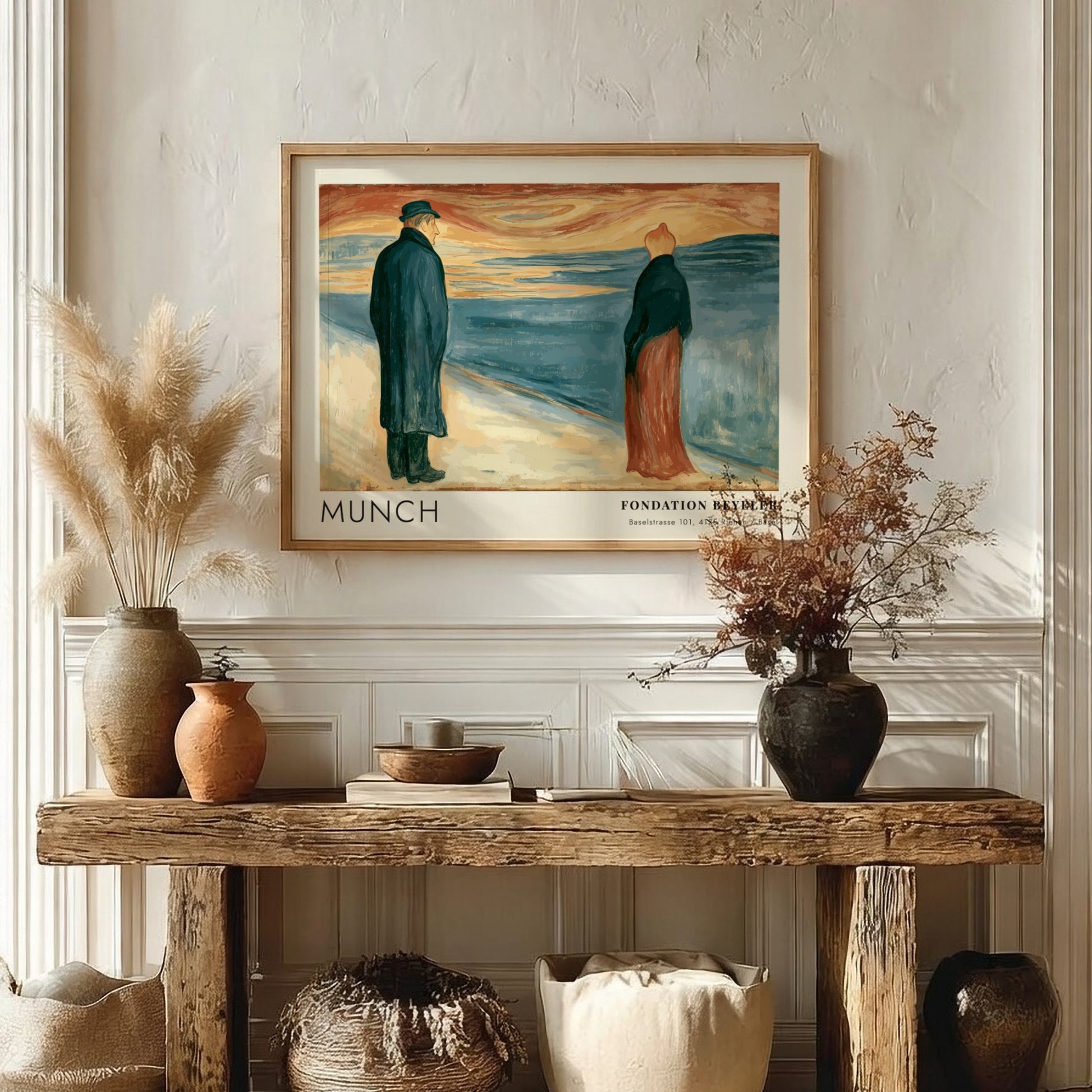 Exhibition poster featuring Edvard Munch painting of two lonely figures by the sea