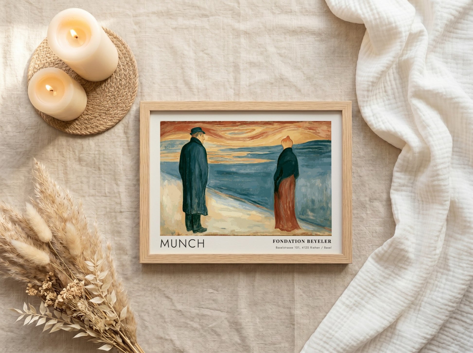 Exhibition poster featuring Edvard Munch painting of two lonely figures by the sea