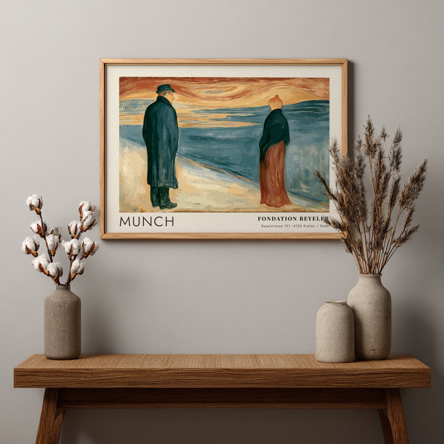 Exhibition poster featuring Edvard Munch painting of two lonely figures by the sea