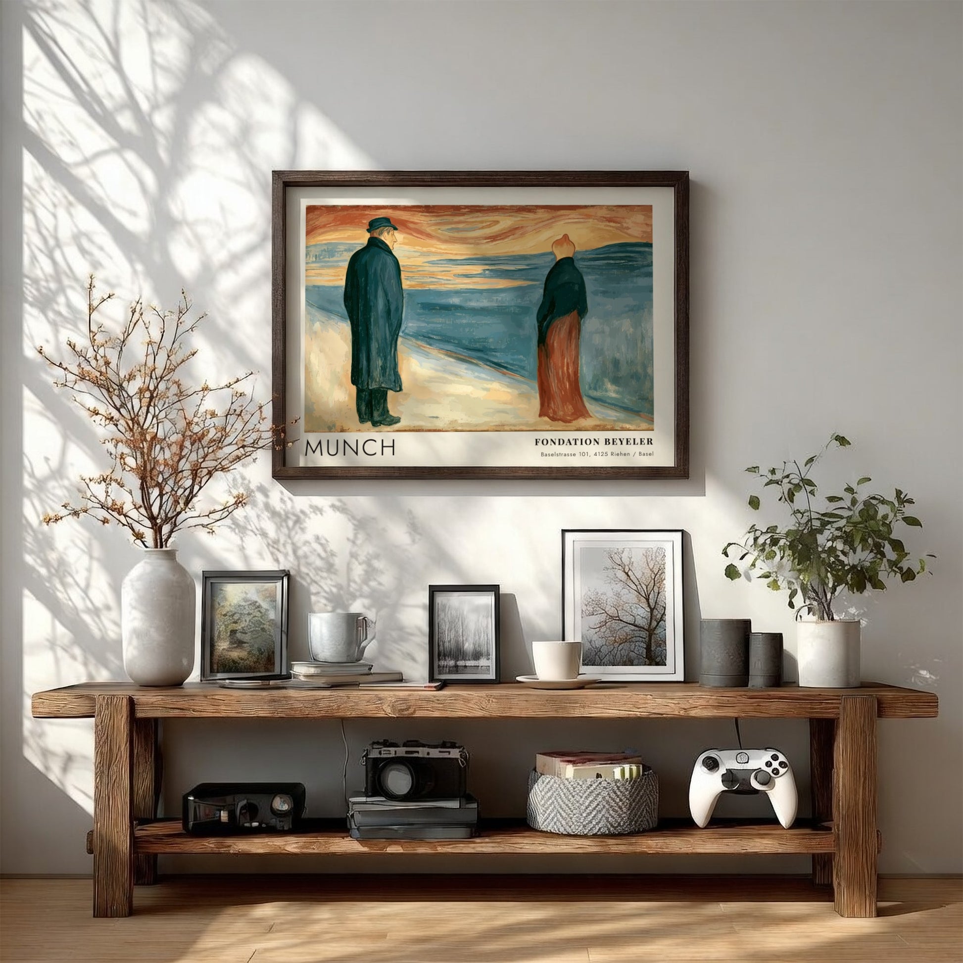 Exhibition poster featuring Edvard Munch painting of two lonely figures by the sea