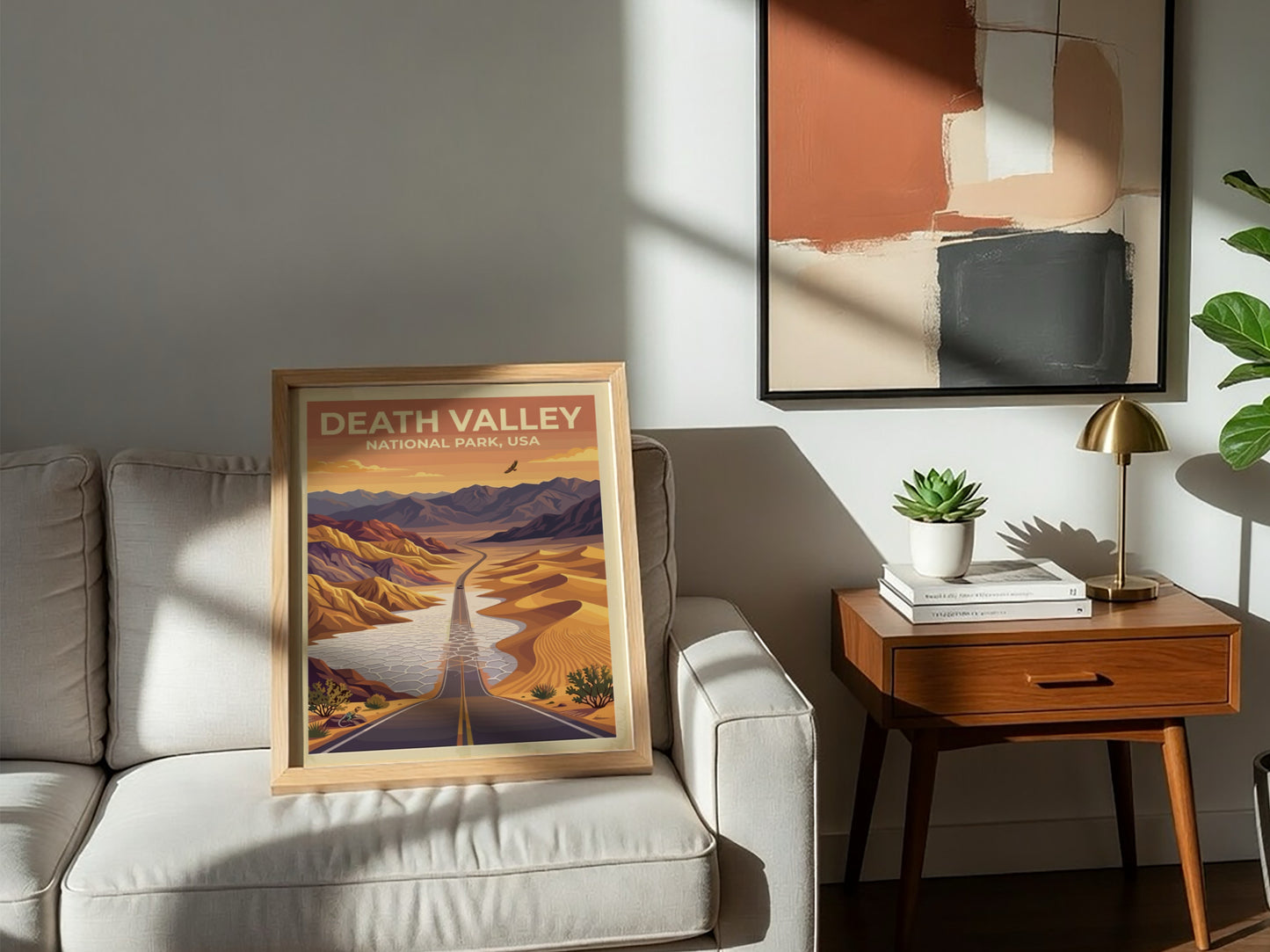 Travel poster of Death Valley National Park featuring a desert road and mountains.