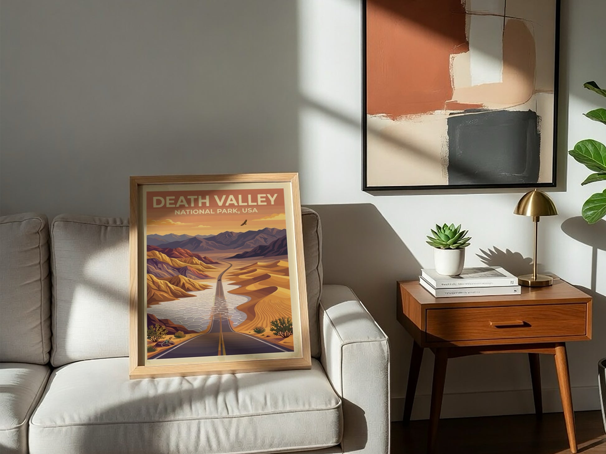 Travel poster of Death Valley National Park featuring a desert road and mountains.