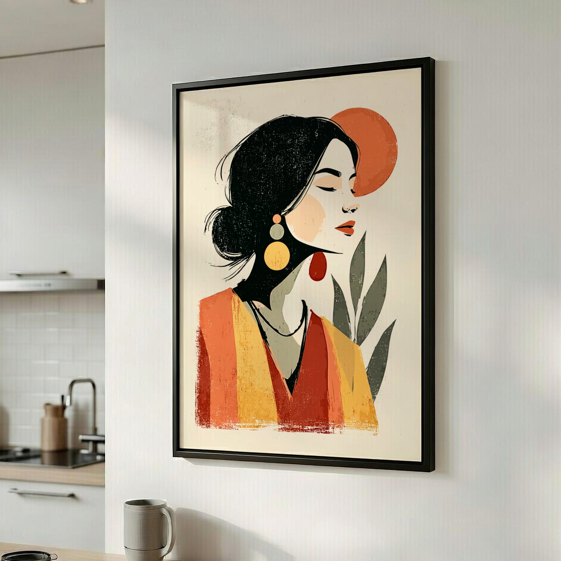 Framed abstract art of a woman's face on a wall in a kitchen.
