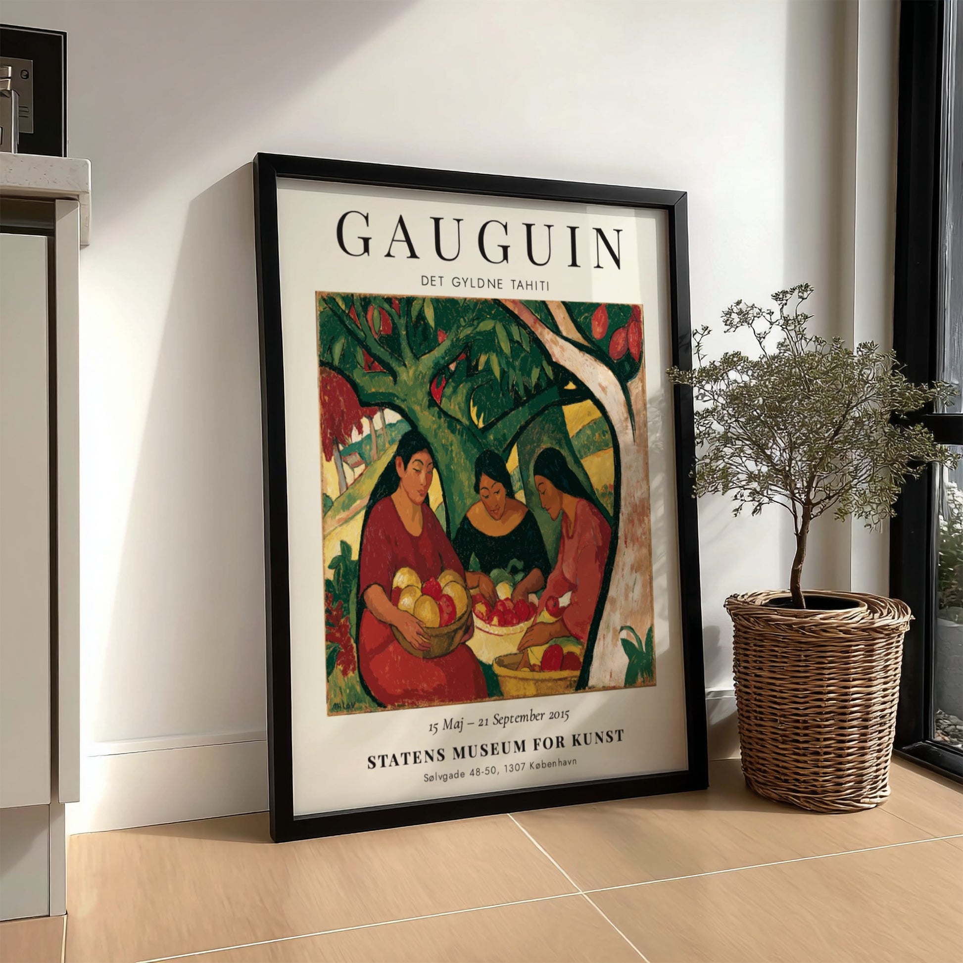 Gauguin exhibition poster featuring women in a vibrant Tahitian scene with rich colors and expressive