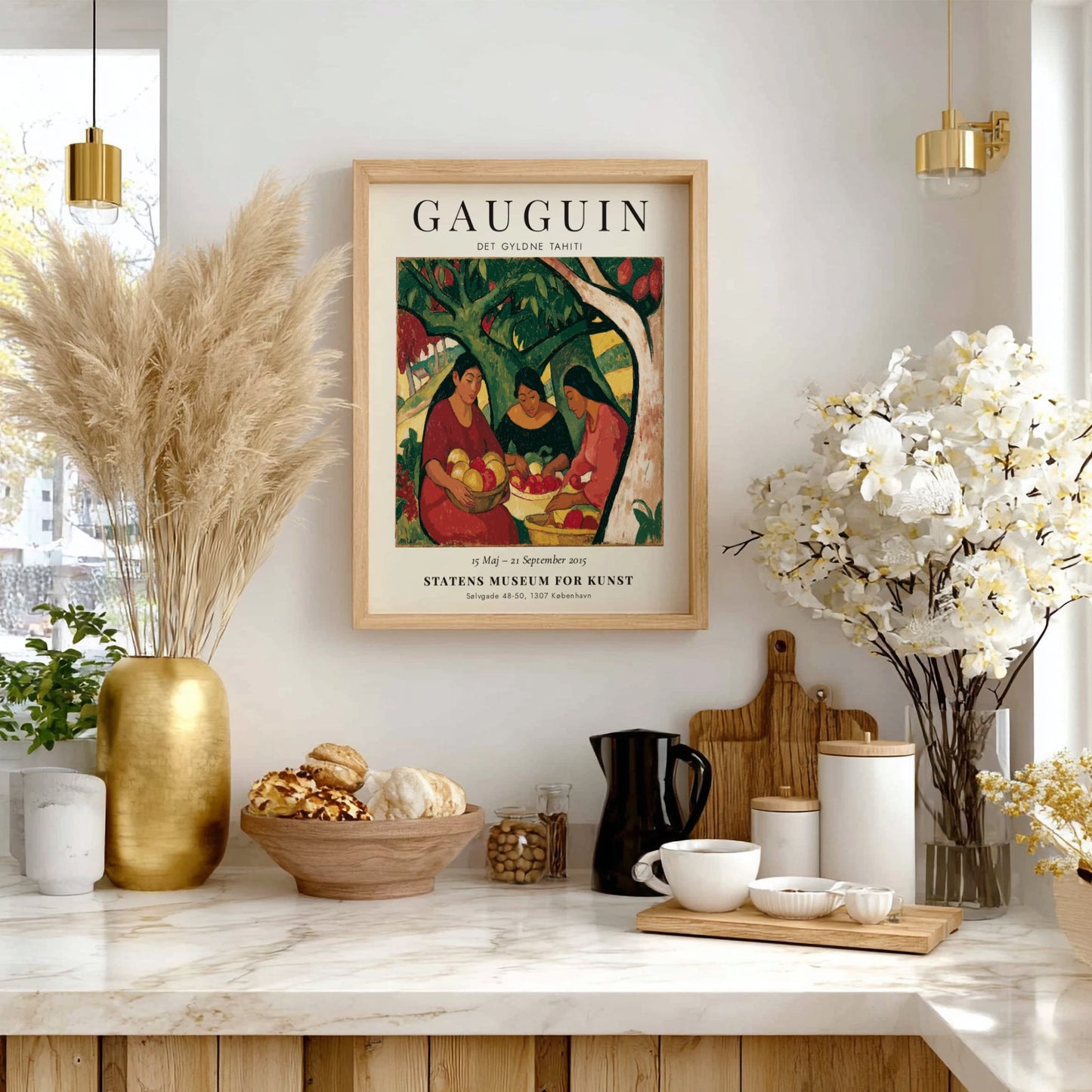 Gauguin exhibition poster featuring women in a vibrant Tahitian scene with rich colors and expressive