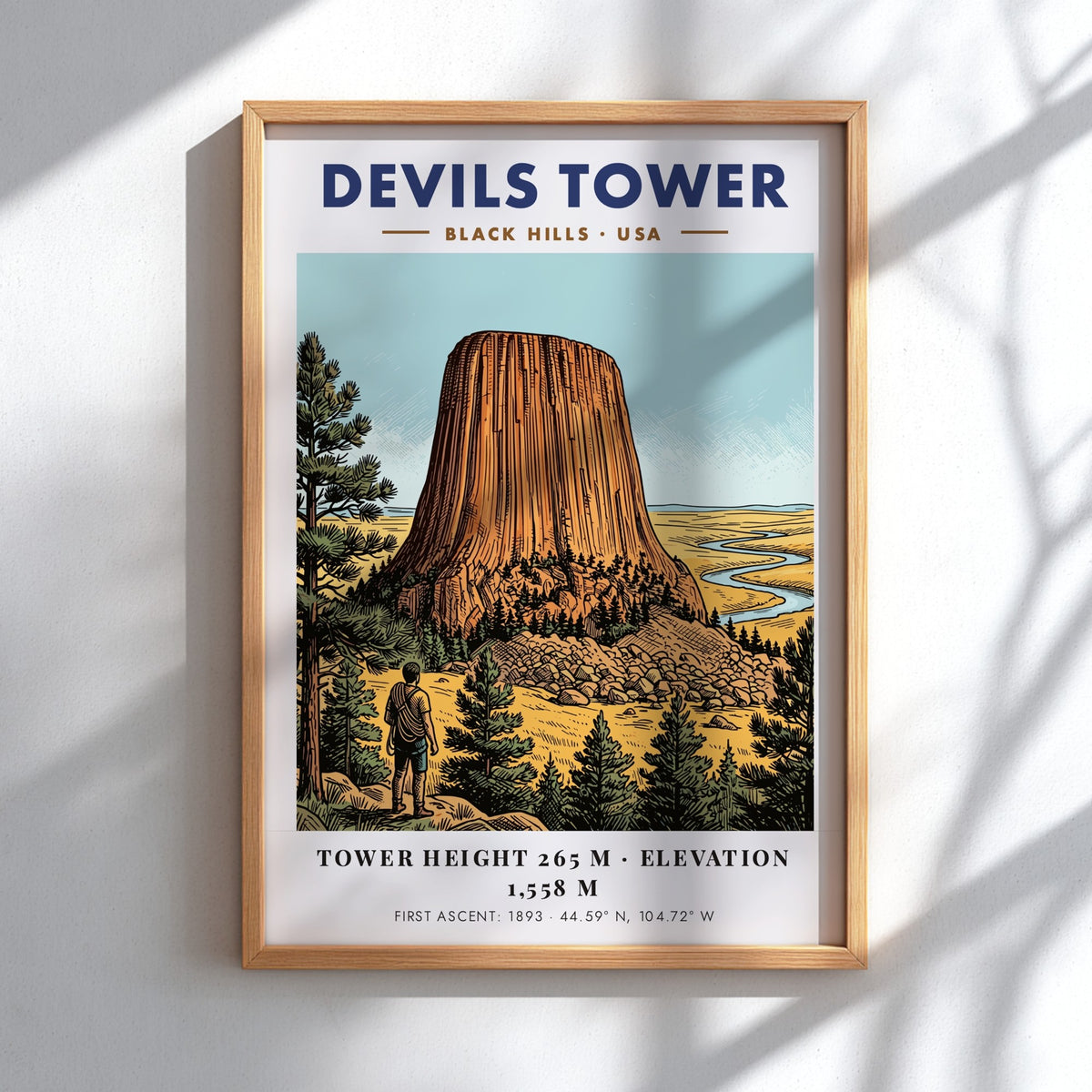 Poster featuring the iconic Devils Tower monolith with a hiker in the foreground.