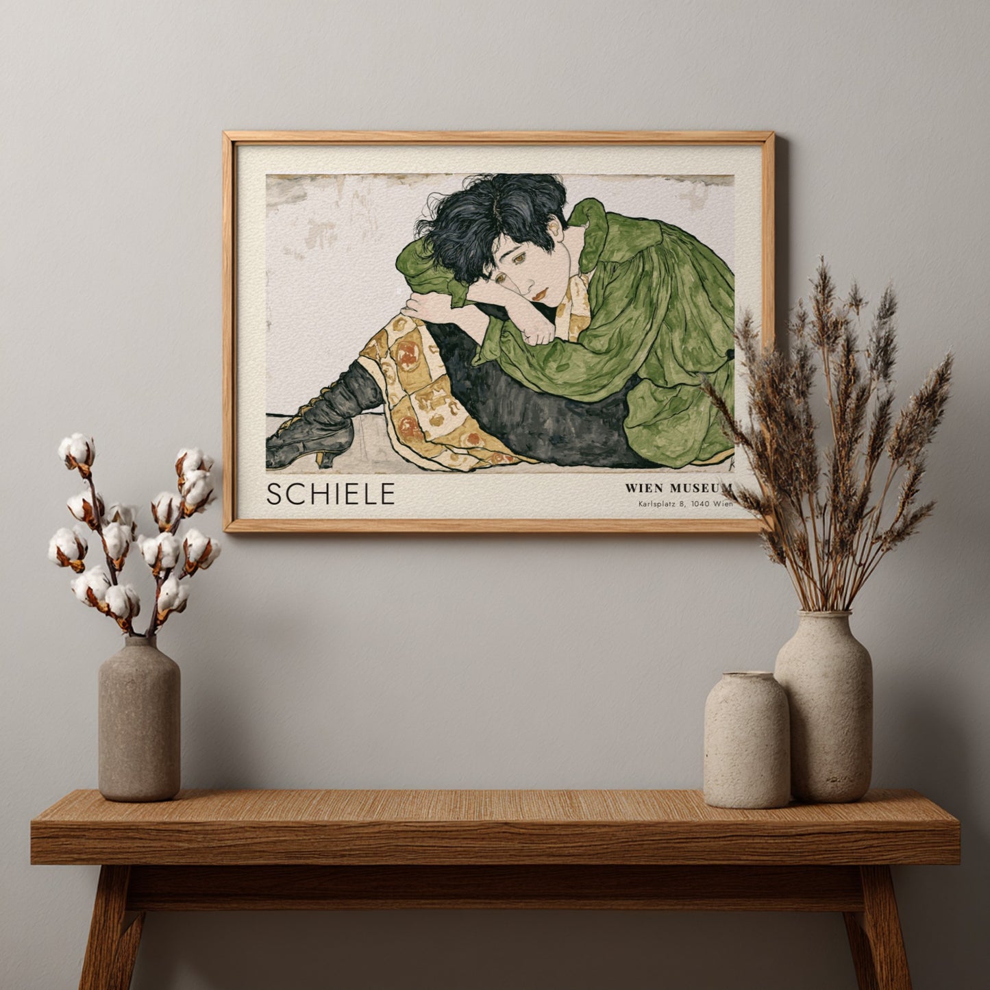 Wall art poster featuring Egon Schiele Die Eremiten with a figure in green.