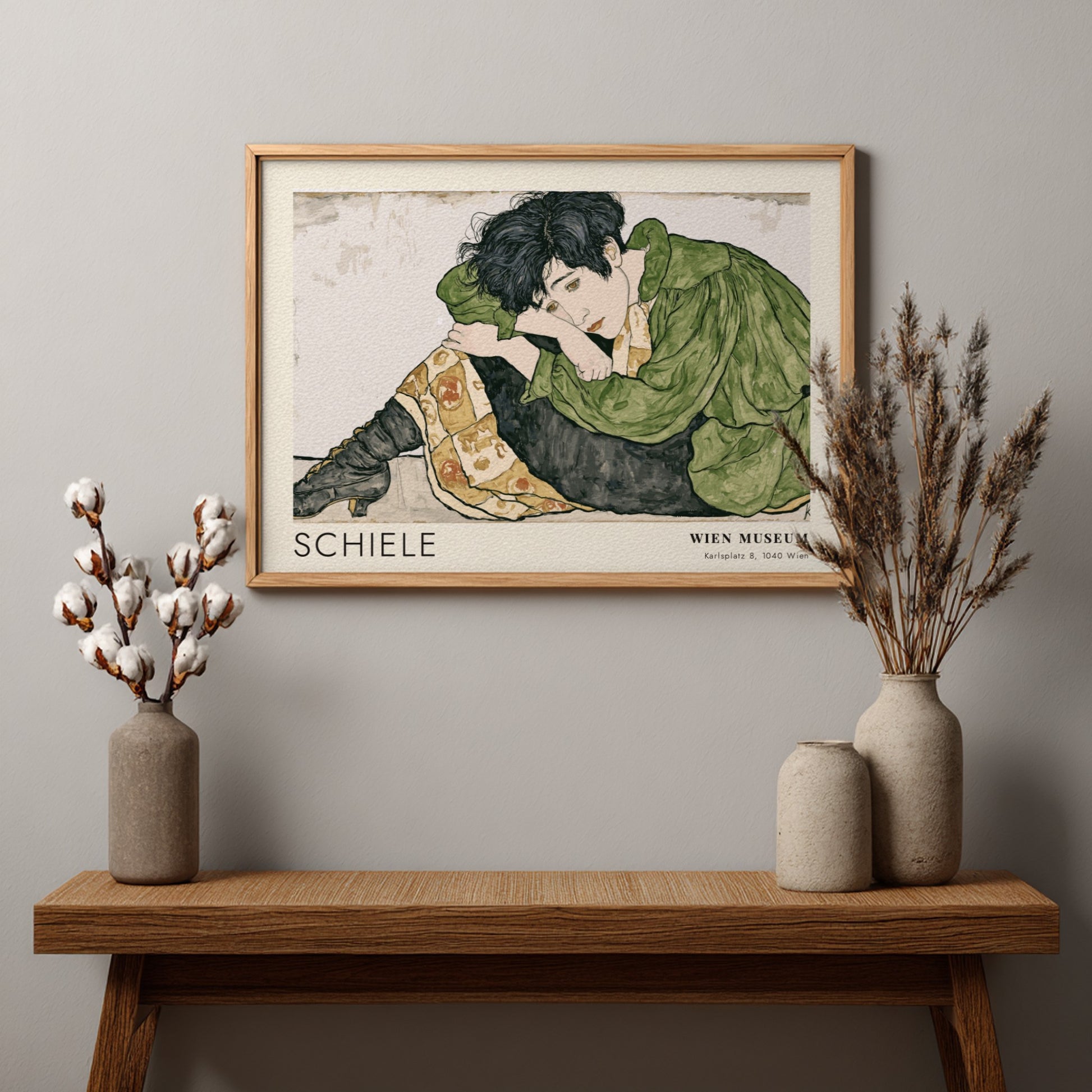 Wall art poster featuring Egon Schiele Die Eremiten with a figure in green.