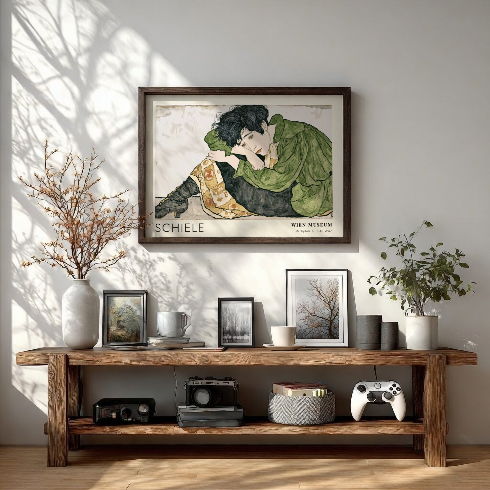 Wall art poster featuring Egon Schiele Die Eremiten with a figure in green.