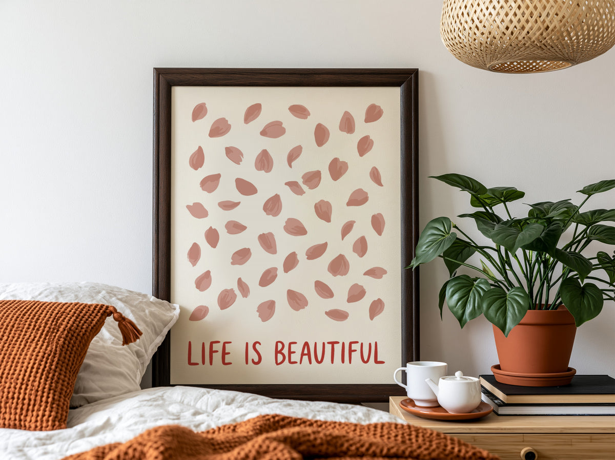Motivational poster with pink cherry blossom petals and the text Life Is Beautiful.