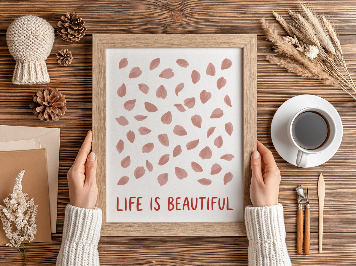 Motivational poster with pink cherry blossom petals and the text Life Is Beautiful.
