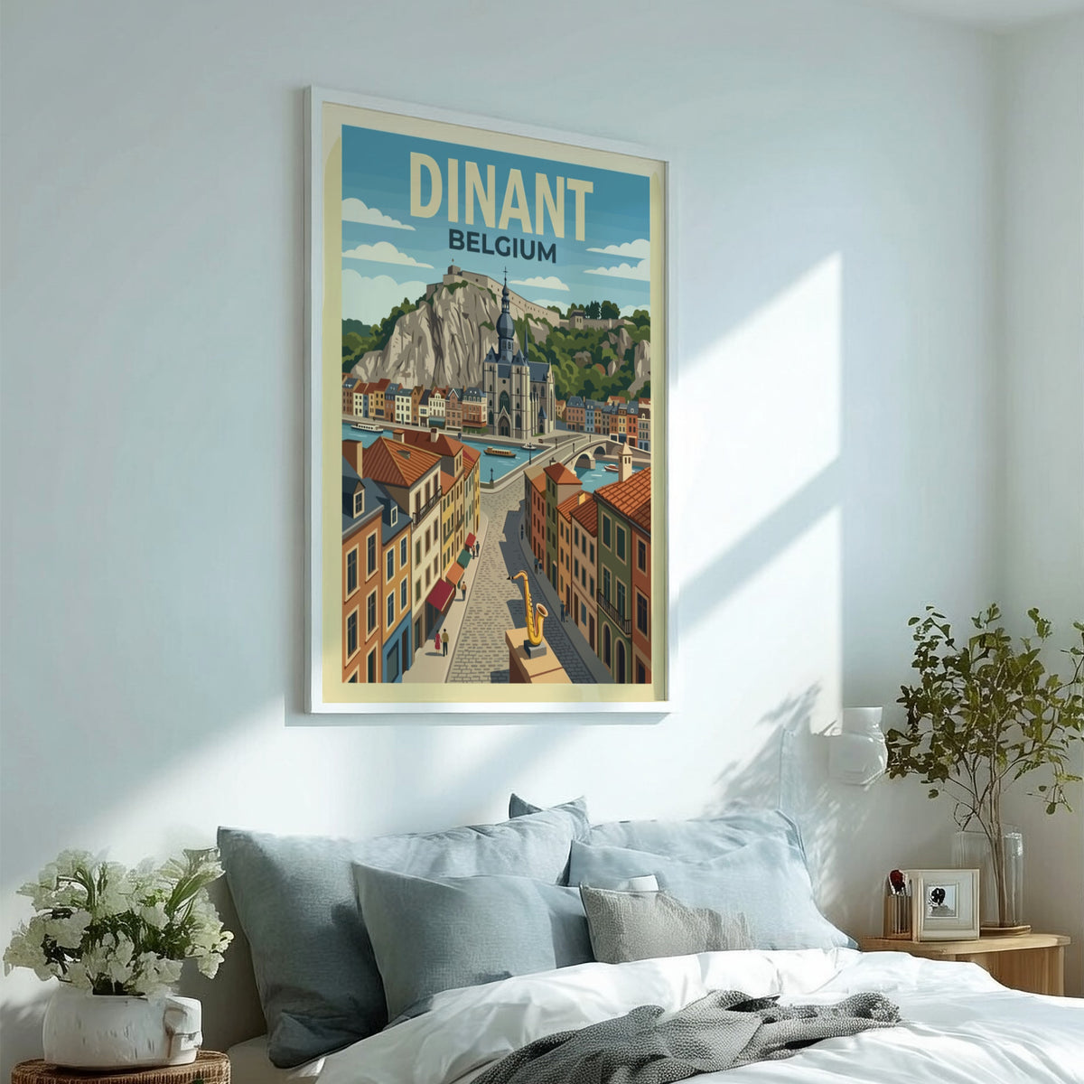Poster of Dinant Belgium featuring a riverside town with colourful houses and saxophone.