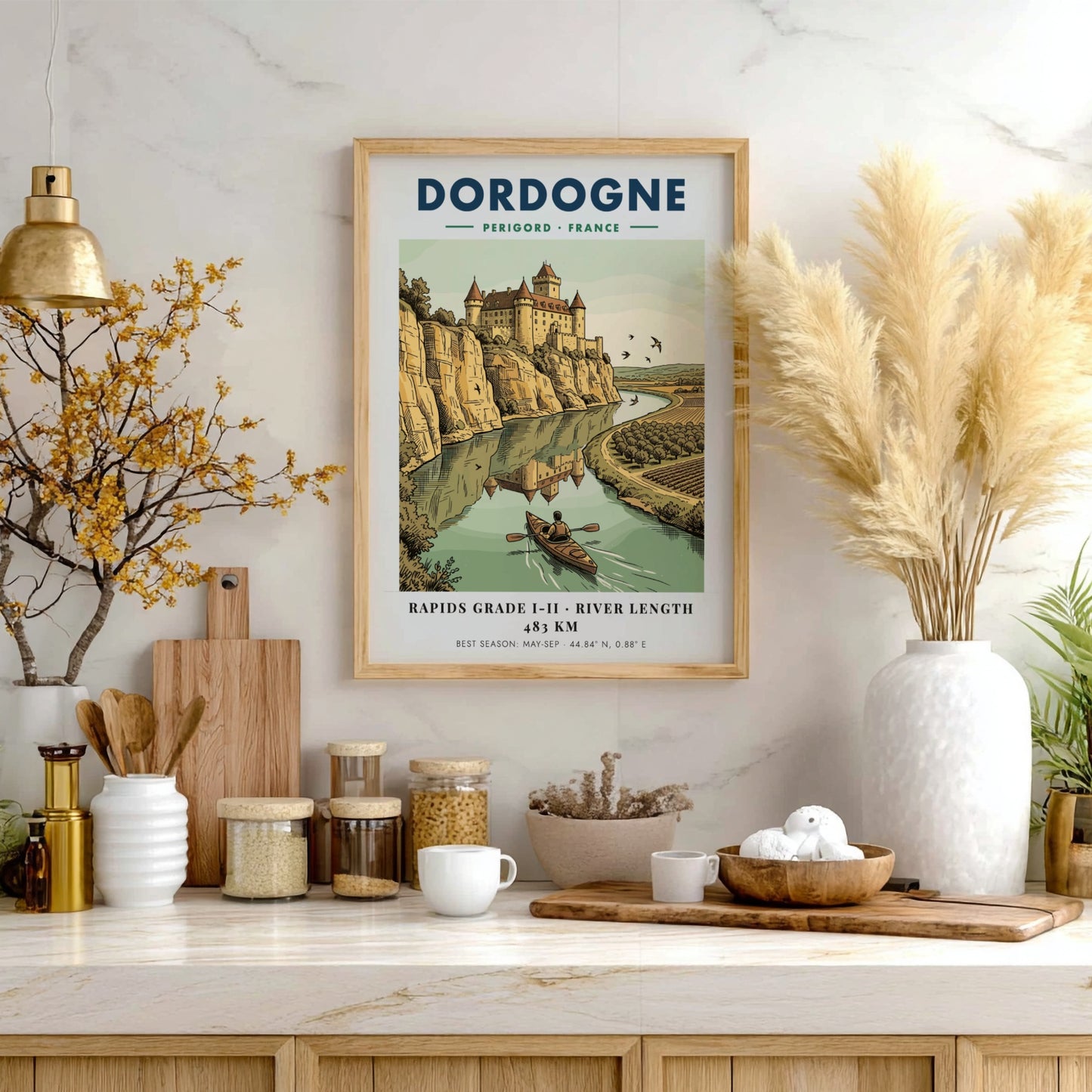 Poster featuring a castle overlooking the Dordogne River with a person kayaking below
