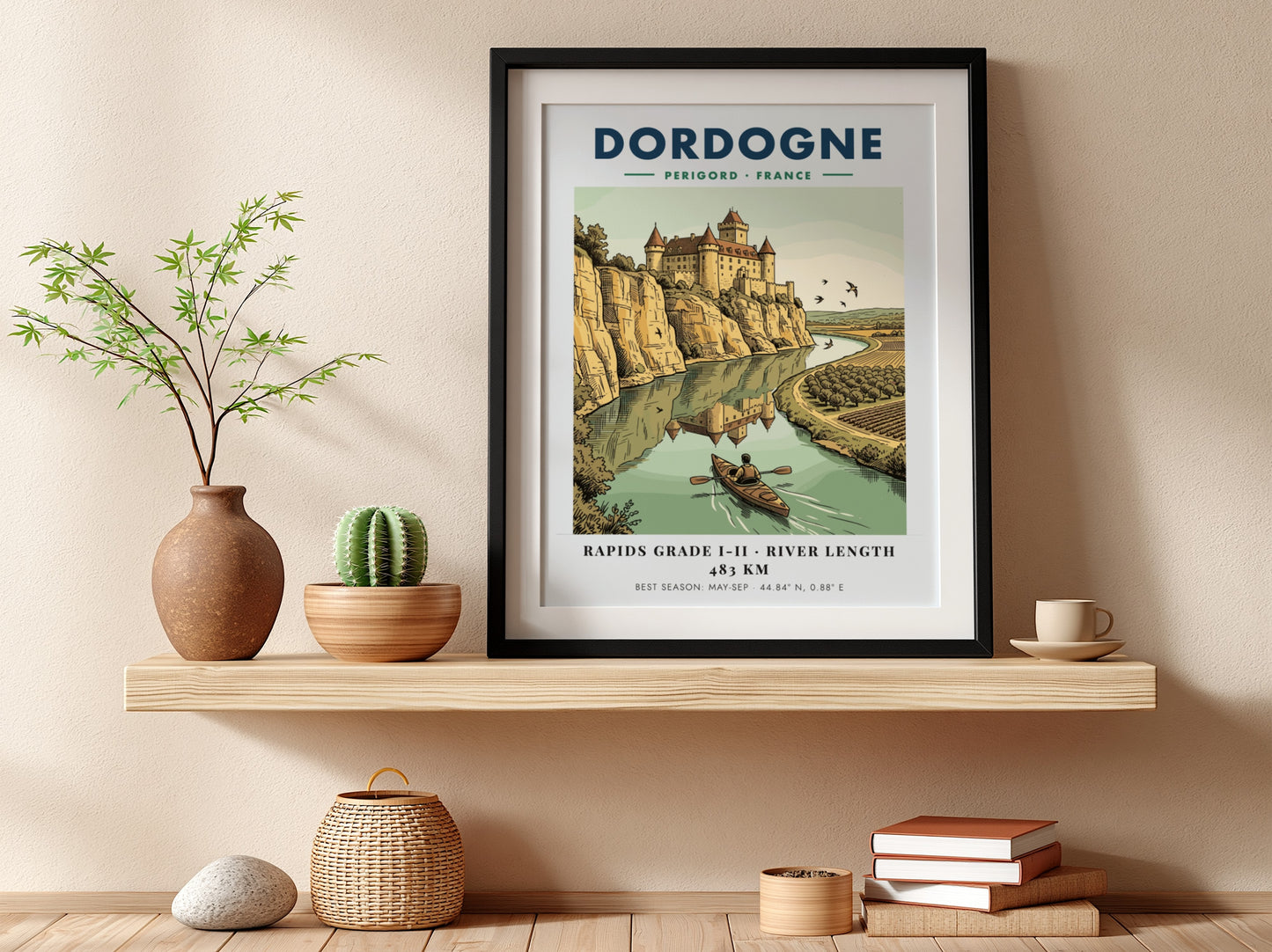 Poster featuring a castle overlooking the Dordogne River with a person kayaking below