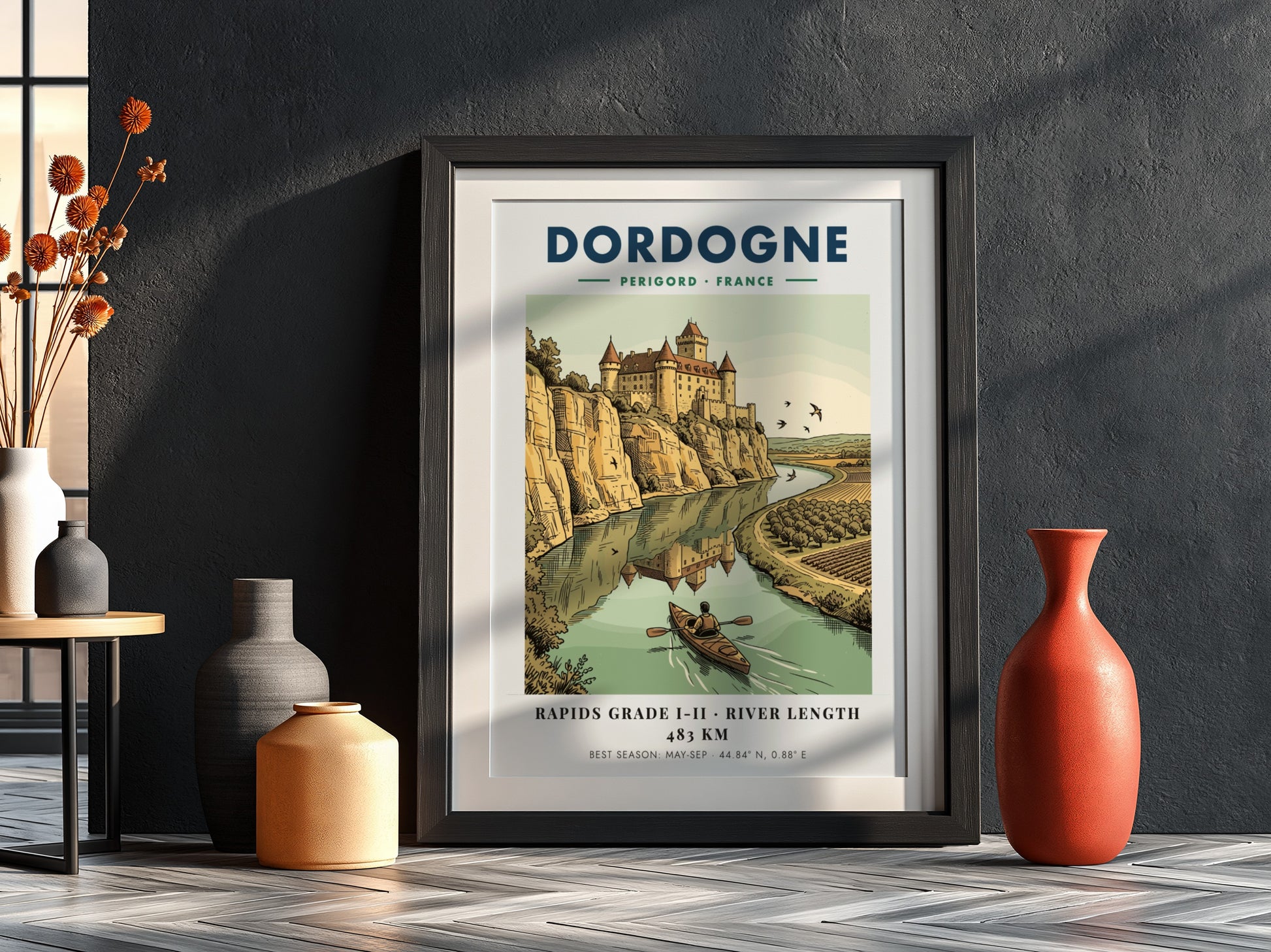 Poster featuring a castle overlooking the Dordogne River with a person kayaking below