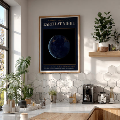 Poster featuring a dark Earth at night with glowing yellow city lights from space.