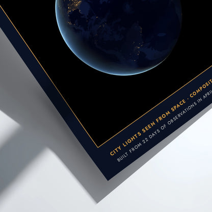 Poster featuring a dark Earth at night with glowing yellow city lights from space.