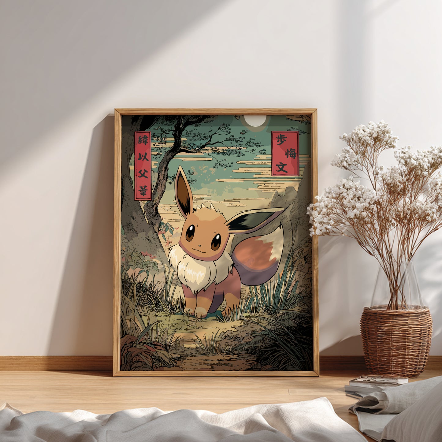 Framed artwork of Eevee Pokemon character in a natural setting on a wall.