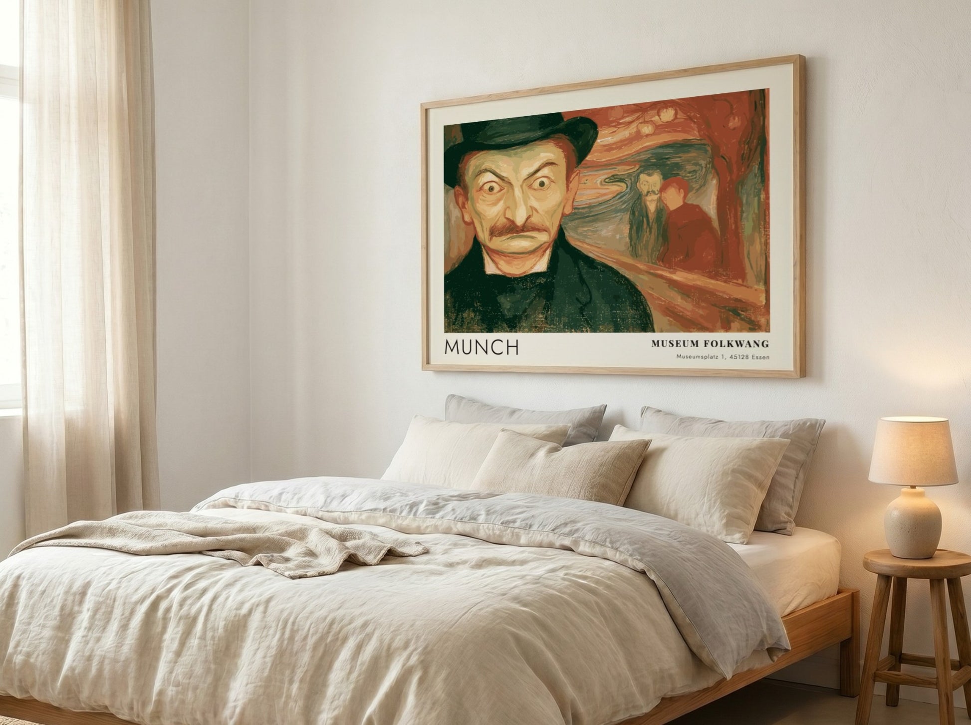Exhibition poster featuring a wide-eyed man by Munch in a wooden frame display.