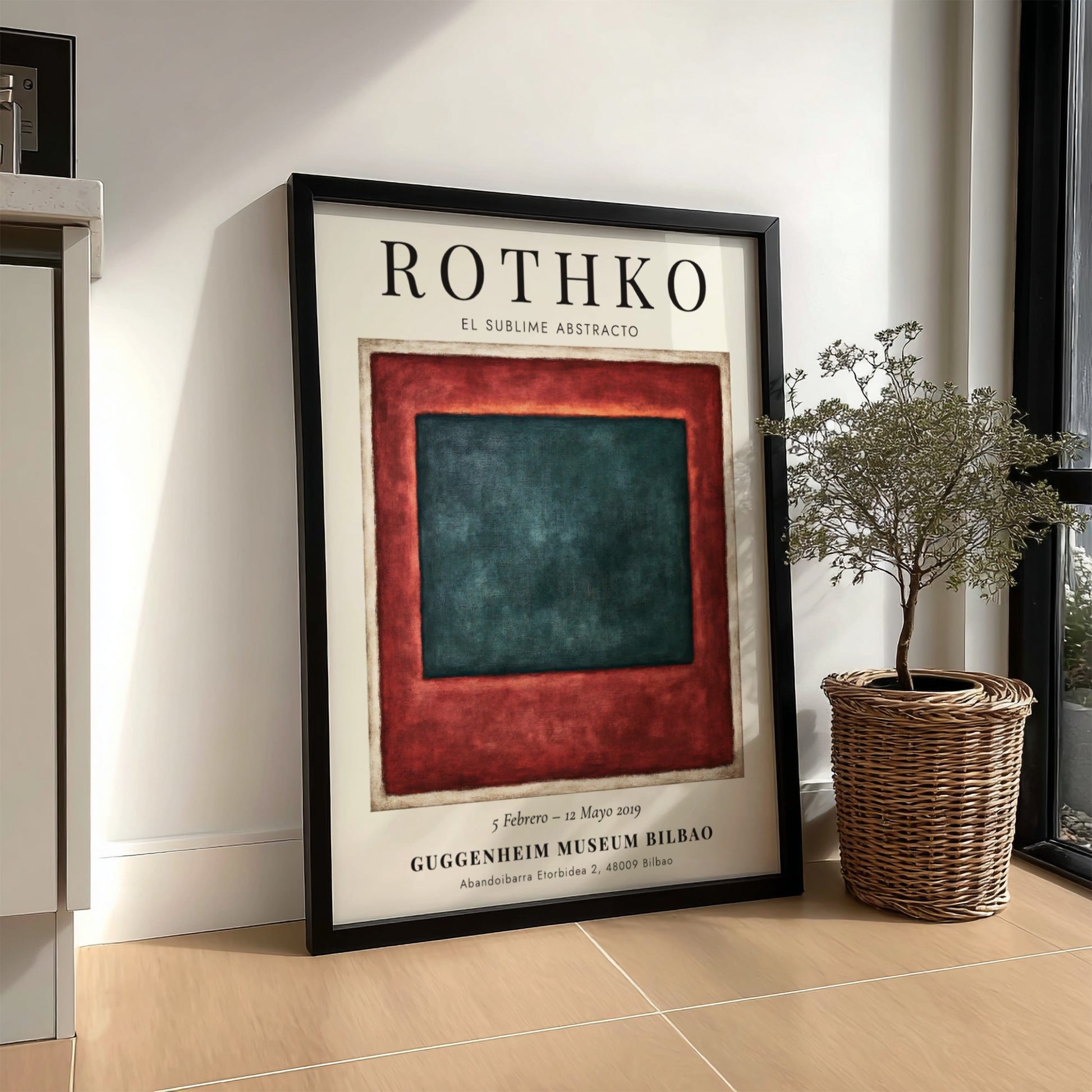 Wall art poster of Mark Rothko exhibition featuring deep teal and red blocks.