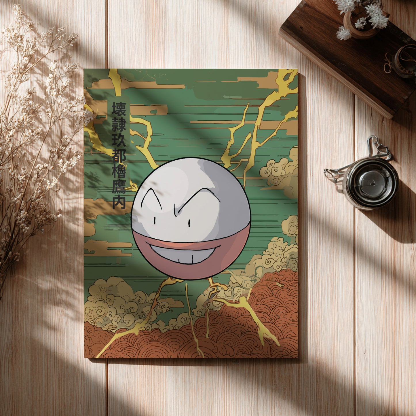 Electrode Pokemon character on a decorative card with Japanese text, placed on a wooden surface.