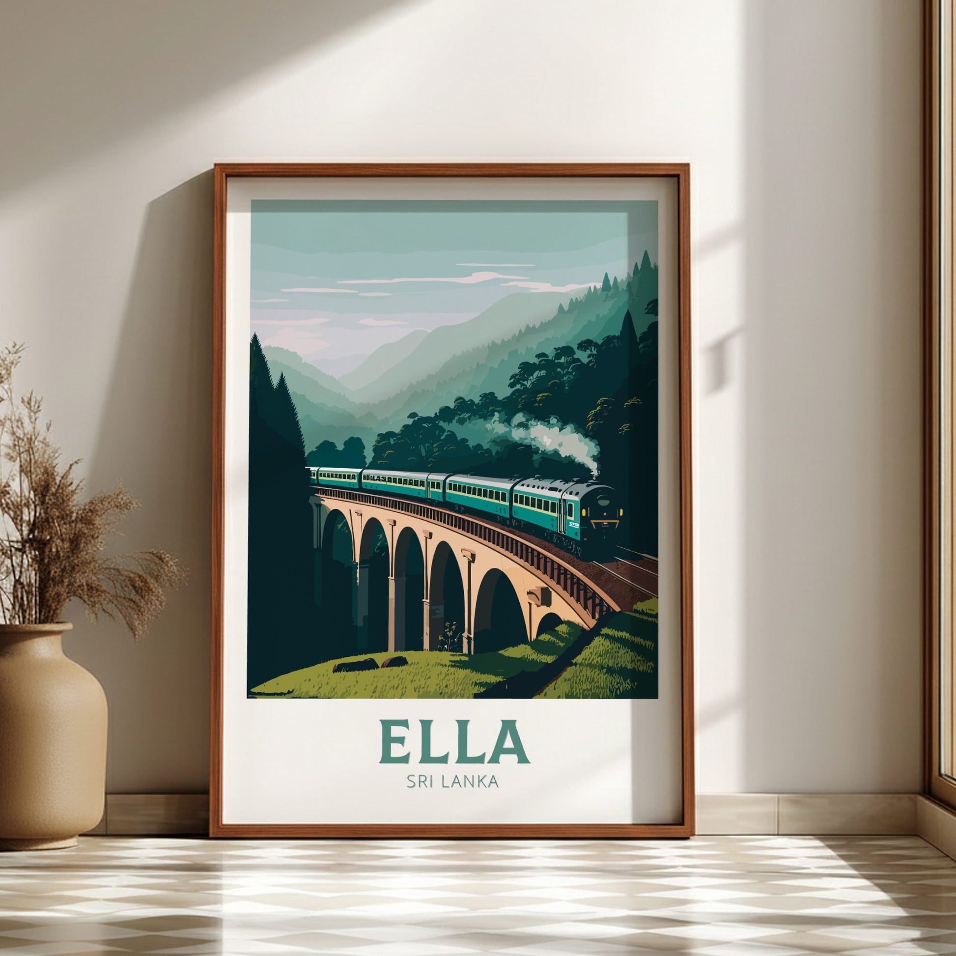 Framed artwork of a train on a bridge with 'Ella, Sri Lanka' text in a room.