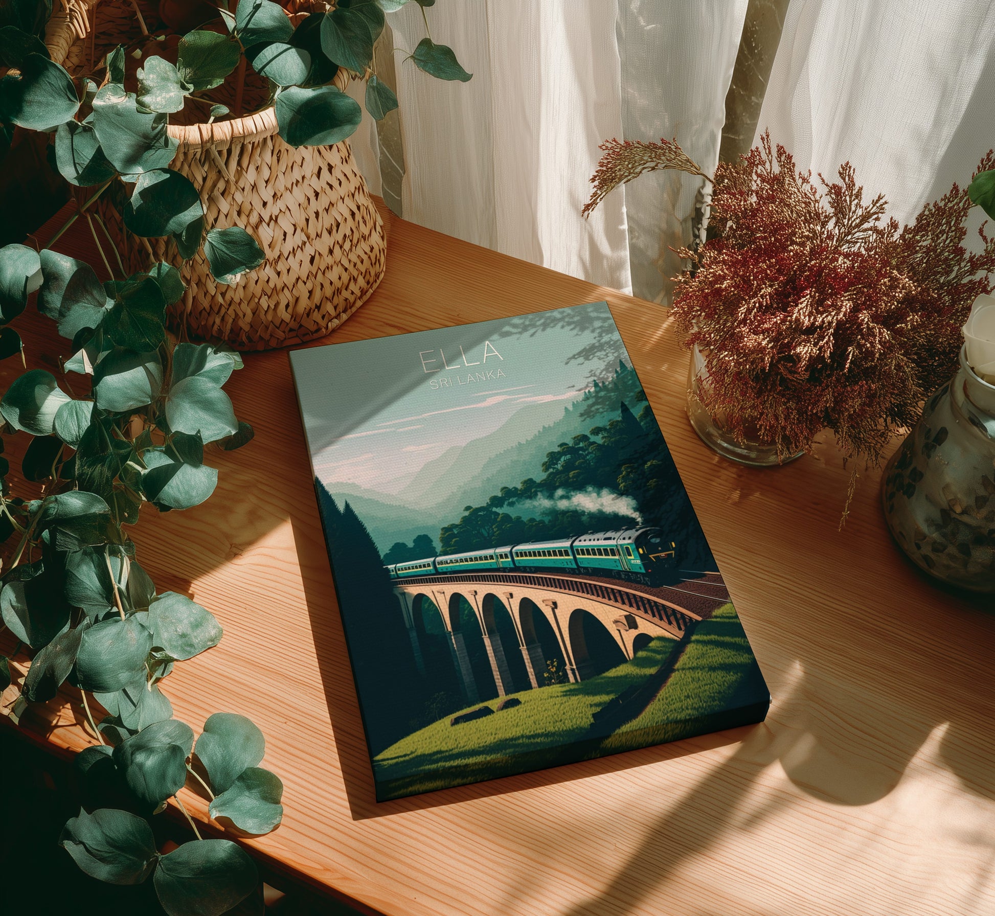 Book titled 'Ella' with a train illustration on a wooden table with plants.