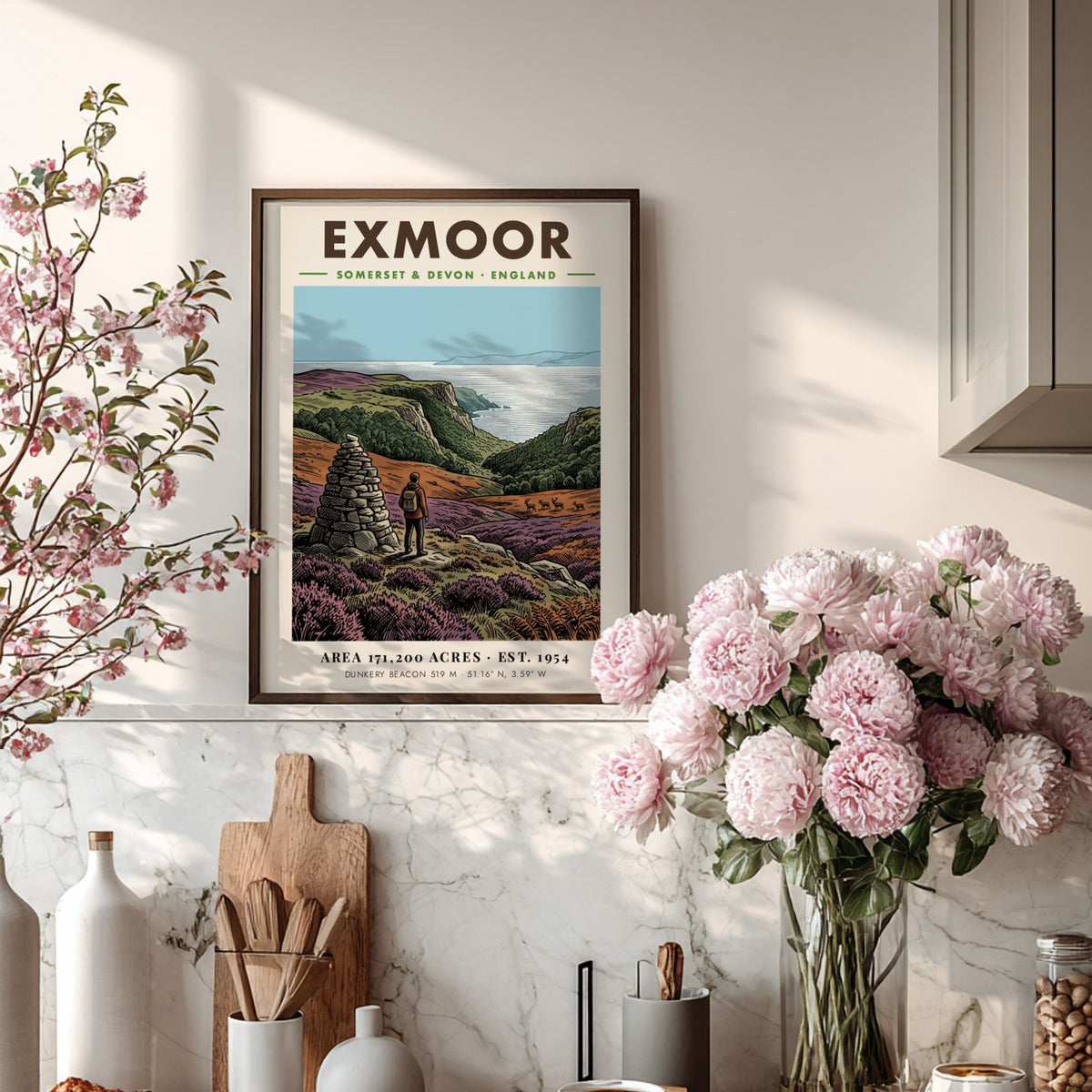Poster of a hiker by a stone cairn overlooking Exmoor coast in England