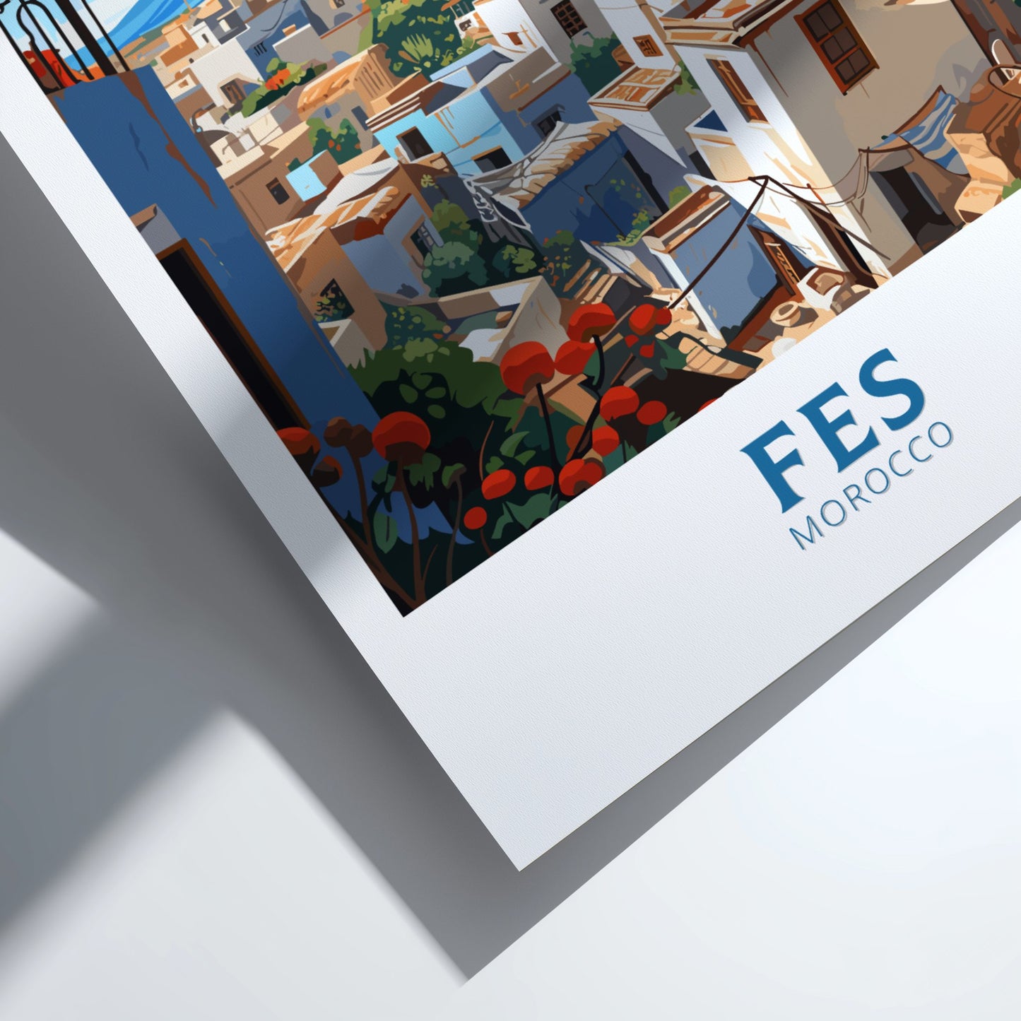 Framed artwork of a scenic view with 'FES MOROCCO' branding.