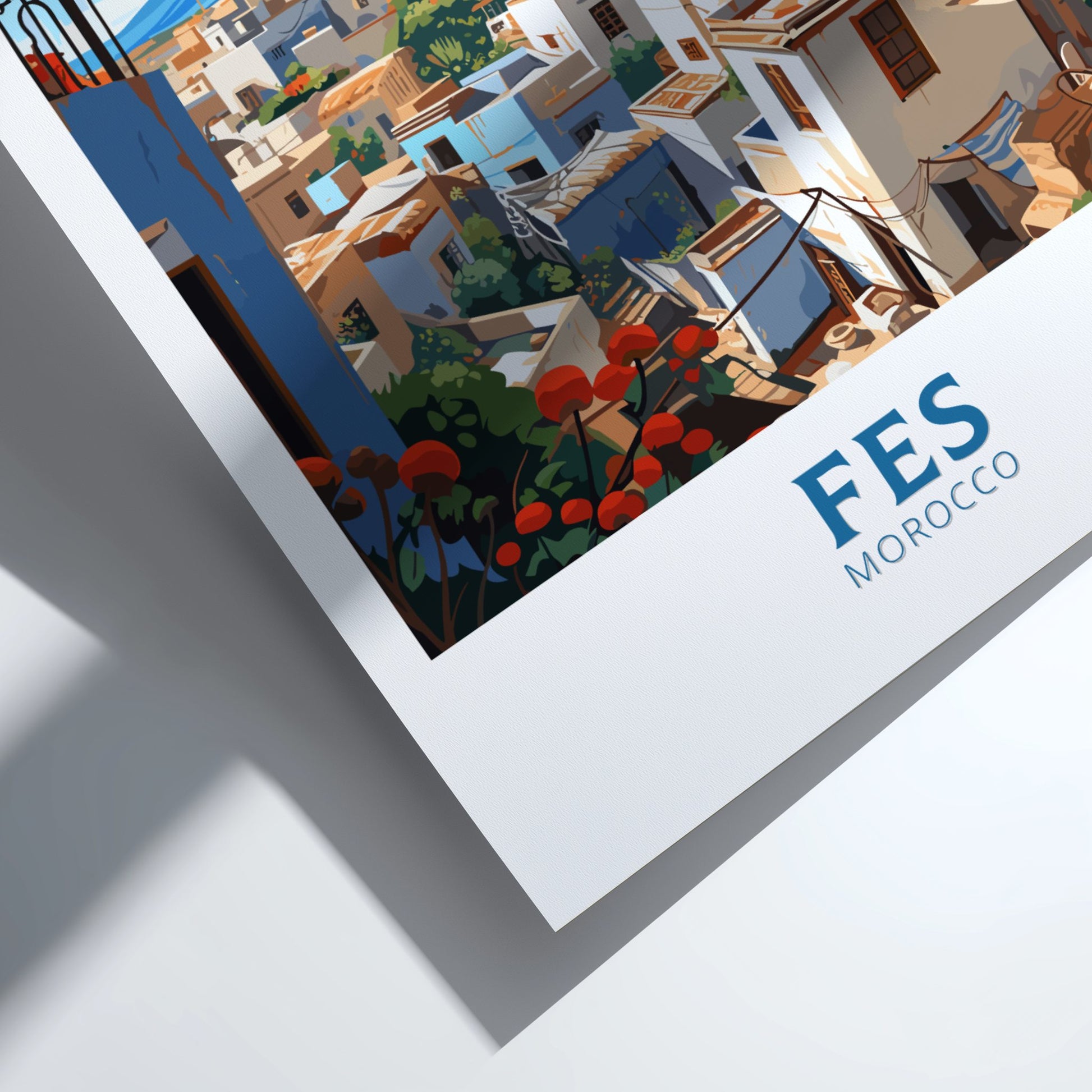 Framed artwork of a scenic view with 'FES MOROCCO' branding.