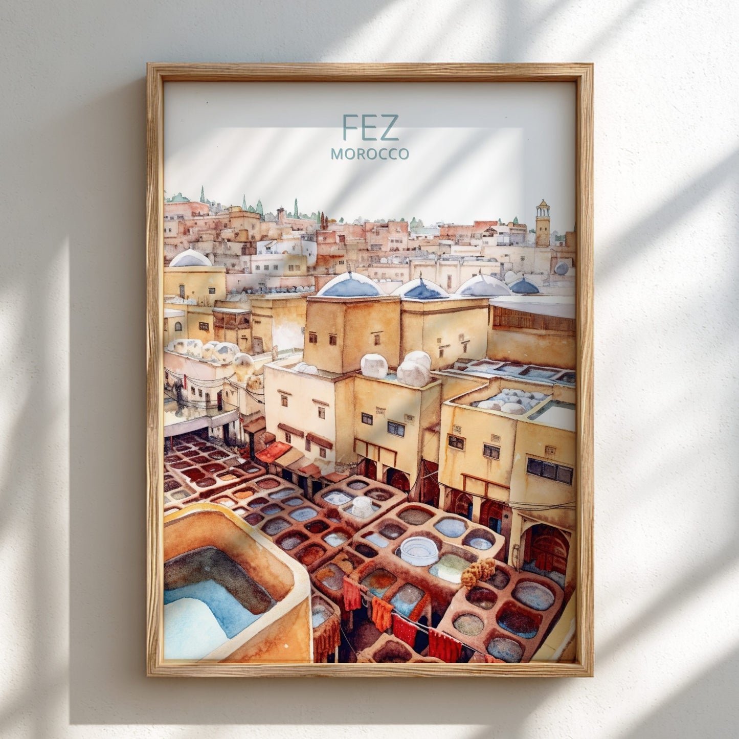 Framed artwork of Fez, Morocco with a view of the city and tanneries.