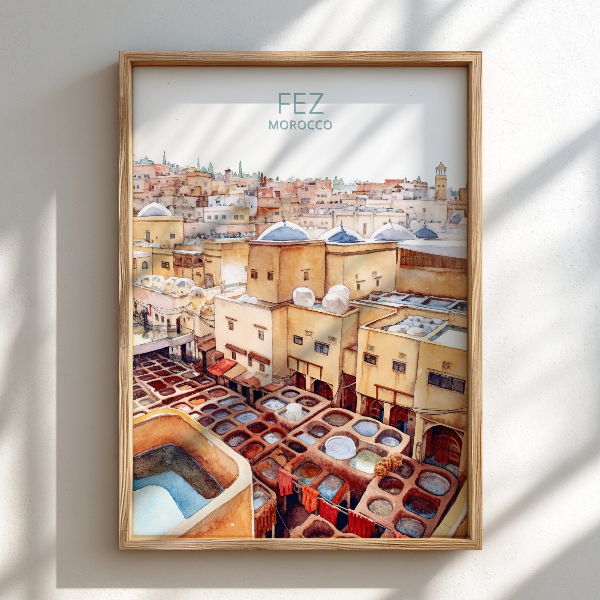 Framed artwork of Fez, Morocco with a view of the city and tanneries.