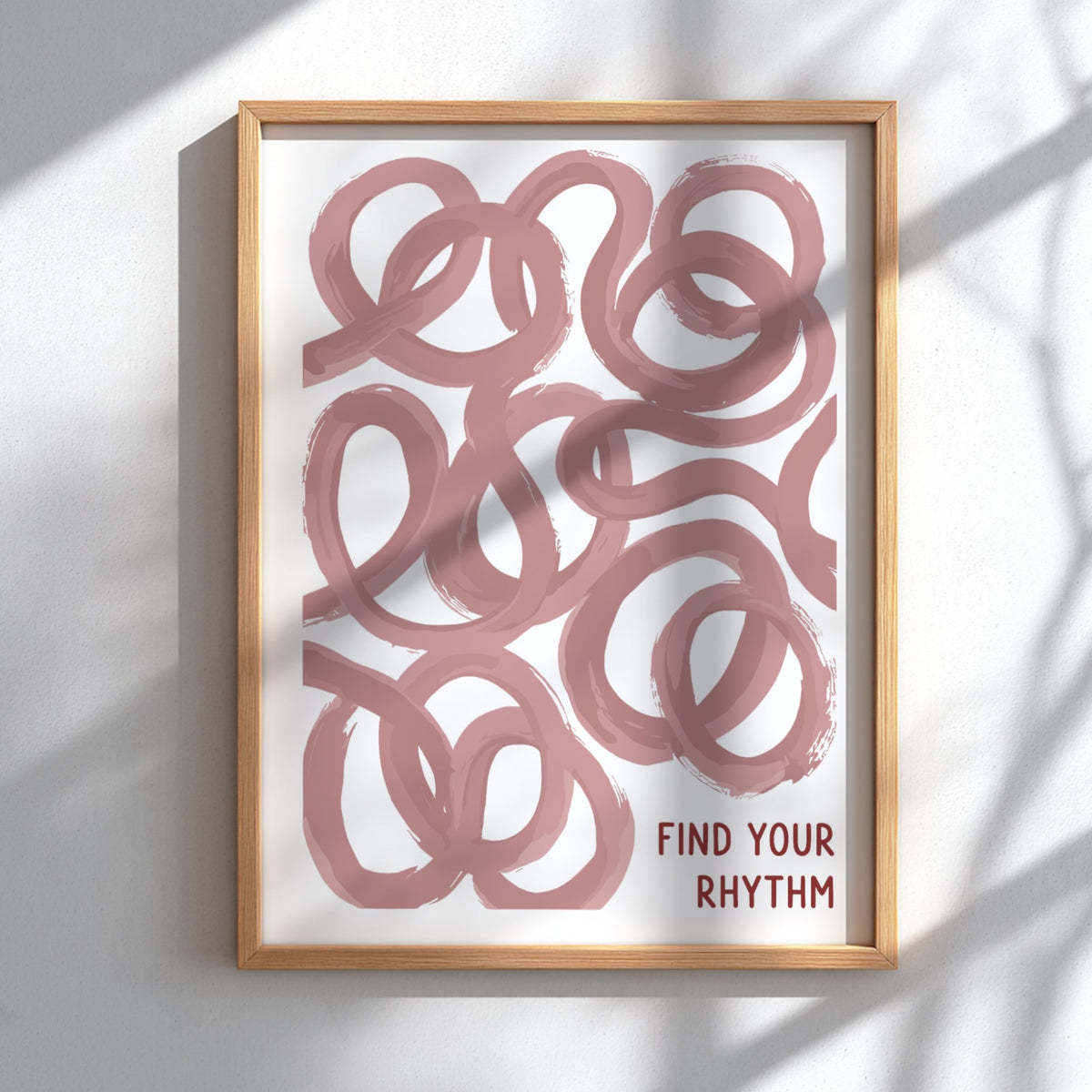 Motivational poster featuring flowing dusty rose loops and the text Find Your Rhythm