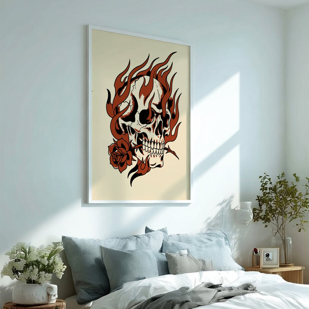 Poster featuring a skull surrounded by stylized flames holding a rose in its teeth