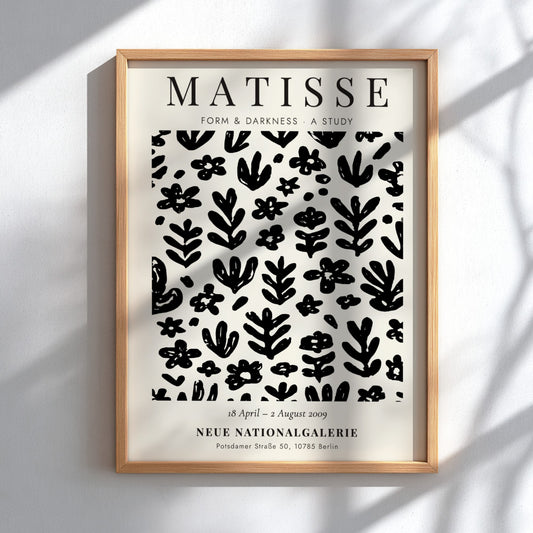 Floral pattern poster featuring black shapes and motifs, inspired by Henri Matisse, ideal for modern decor.